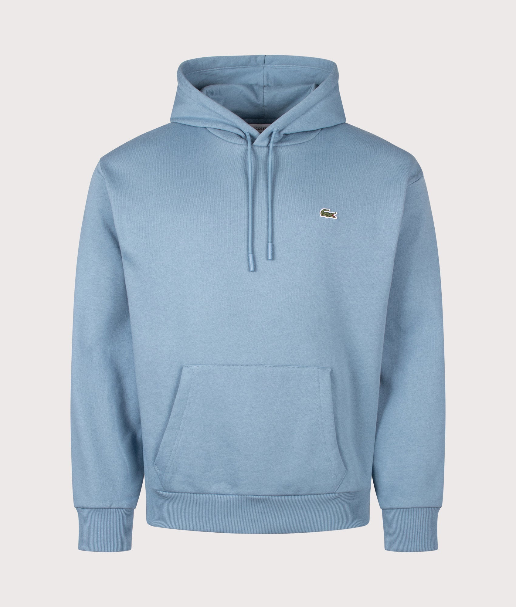 Lacoste Classic Fit Fleece Hoodie in Aral at EQVVS Menswear. Front shot.