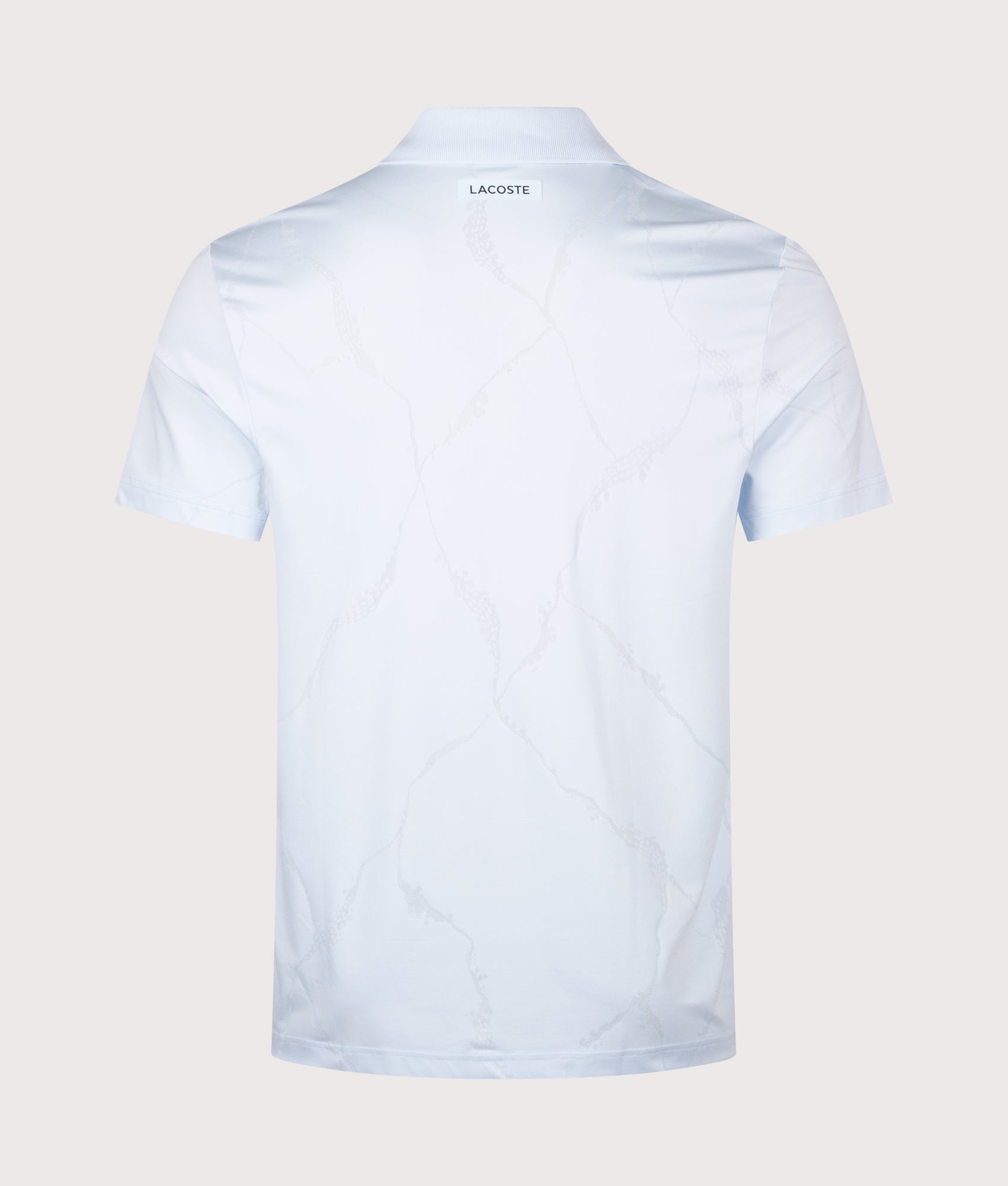 Lacoste Slim Fit Ultra Dry Jacquard Crocodile Tennis Polo Shirt in Sugared Blue at EQVVS Menswear. Back shot.
