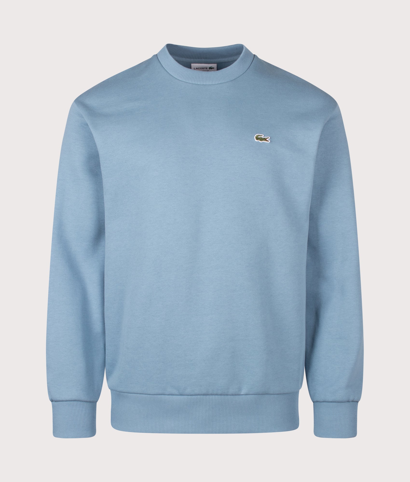 Lacoste Classic Fit Round Neck Sweatshirt in Aral at EQVVS Menswear. Front shot.