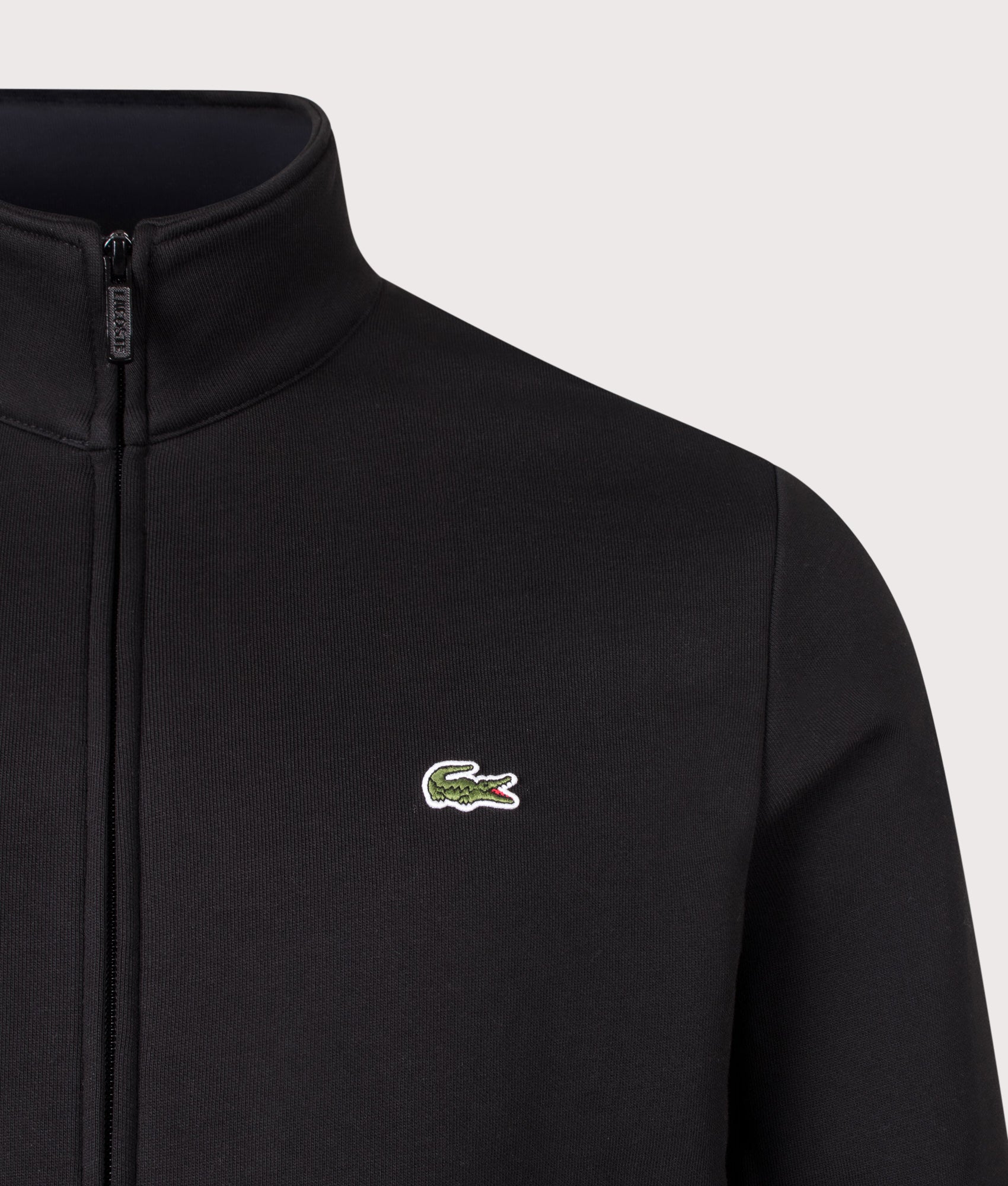 Lacoste Regular Fit Zip Through Sweatshirt in Black at EQVVS Menswear. Detail shot.