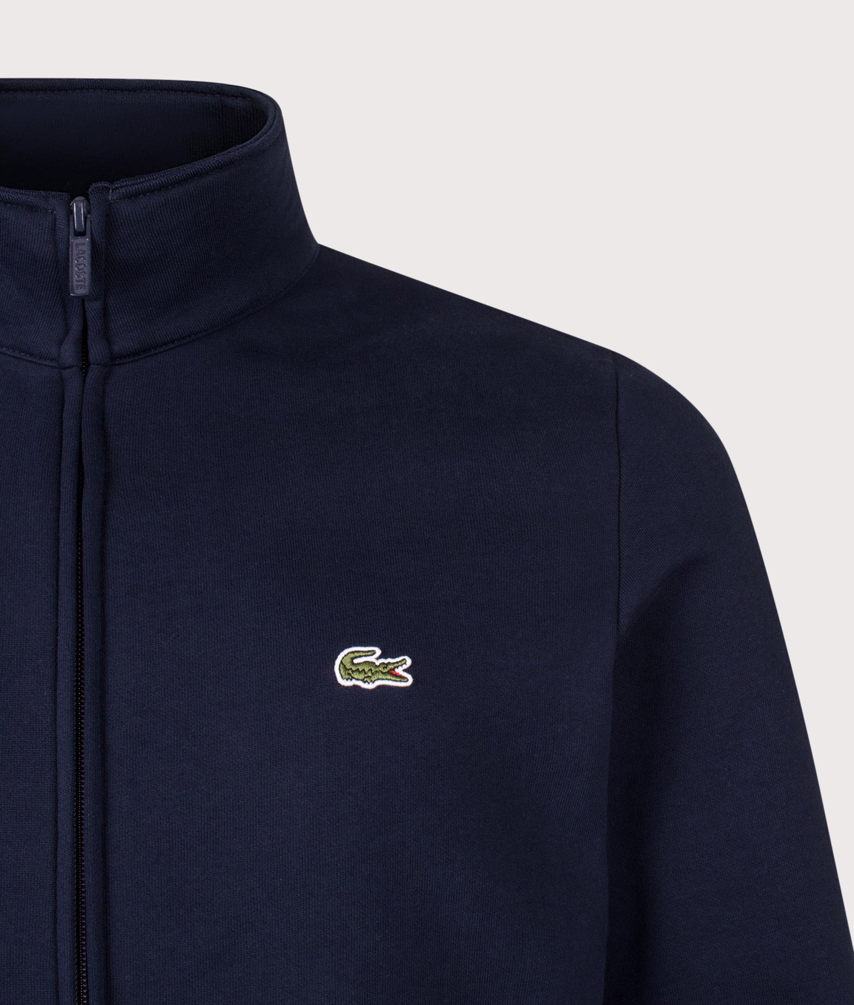 Lacoste Regular Fit Zip Through Sweatshirt in Navy Blue at EQVVS Menswear. Detail shot.