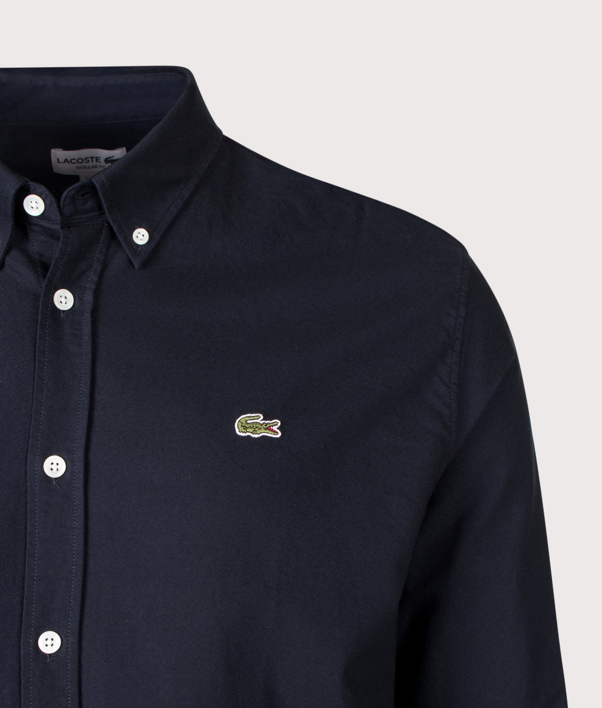 Lacoste Regular Fit Oxford Shirt arrives in Abysm at EQVVS Menswear. Detail shot.