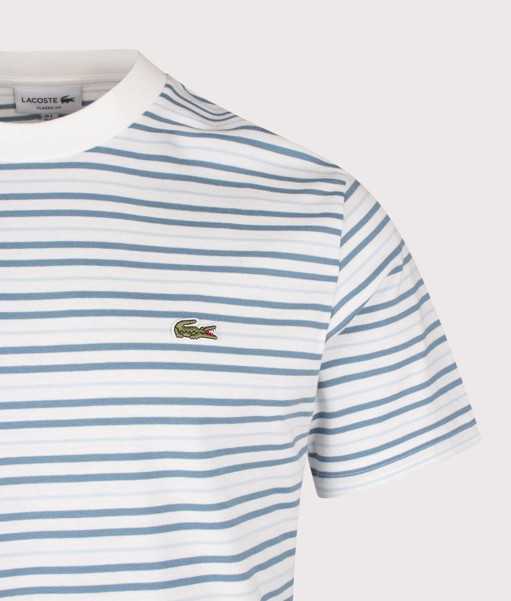 Lacoste Classic Fit Striped T-Shirt in Aral and Flour at EQVVS Menswear. Detail shot.
