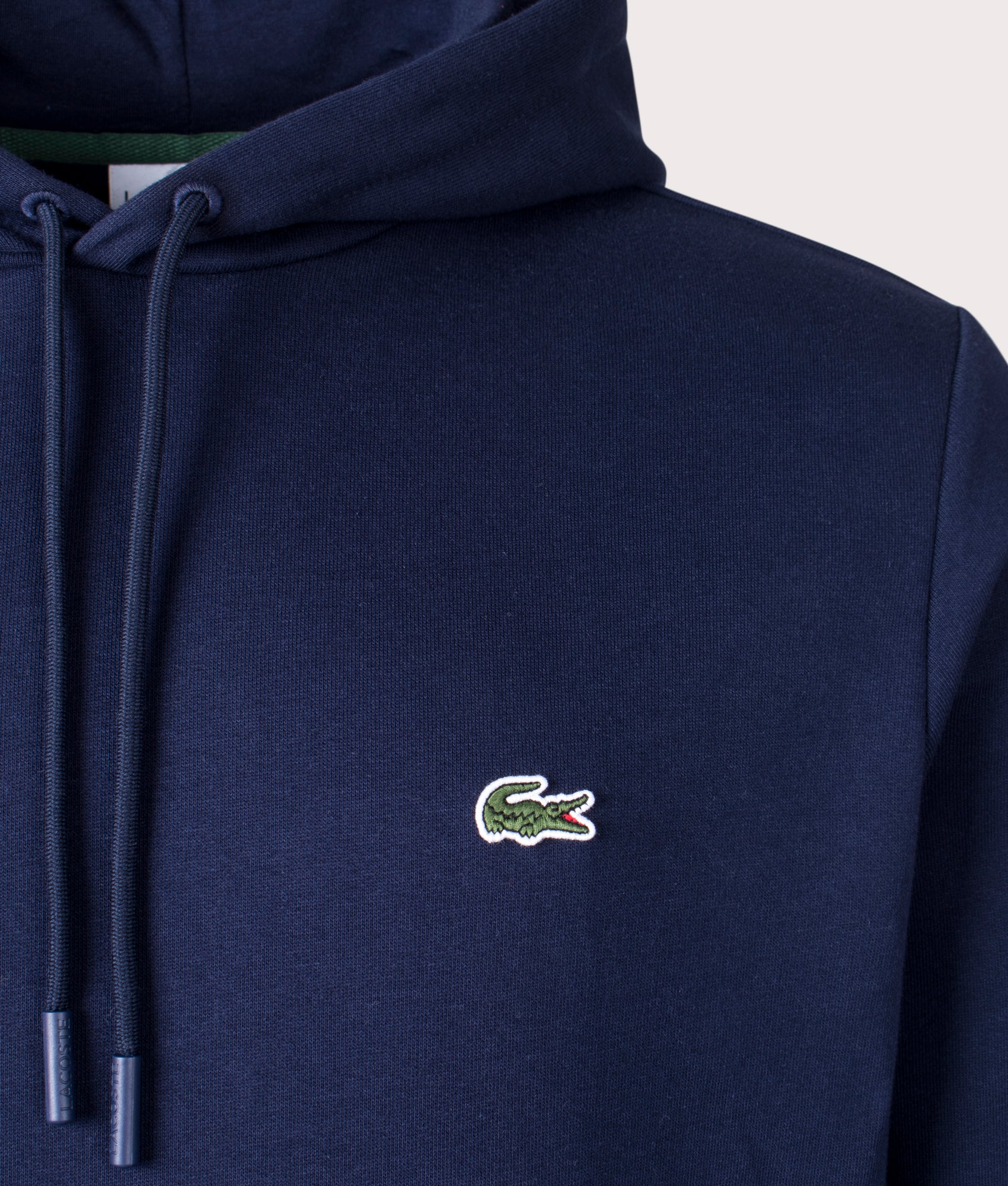 Lacoste Brushed Fleece Hoodie Navy in Navy Blue at EQVVS Menswear. Detail shot.