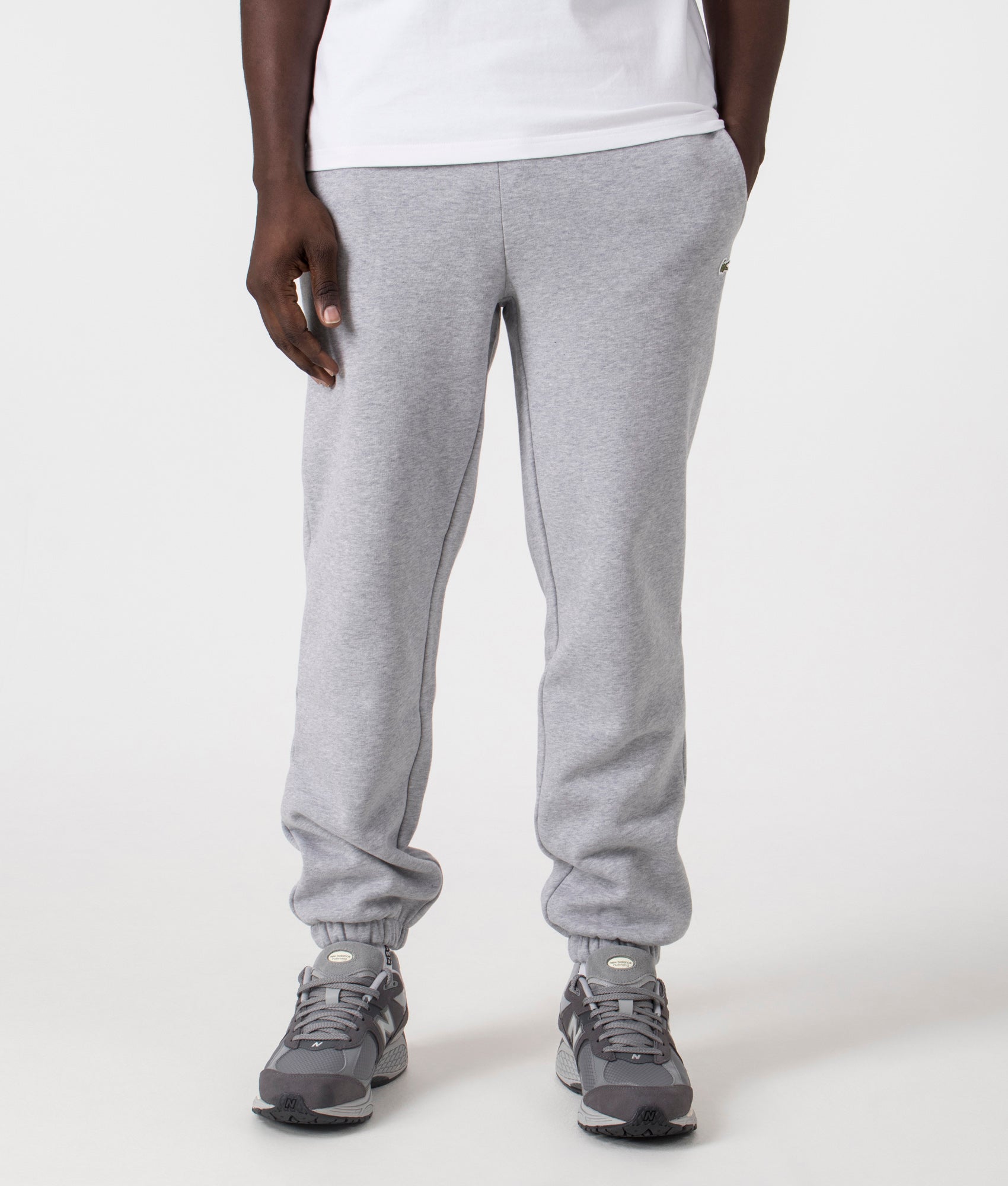 Lacoste Brushed Fleece Joggers in Silver Chine. Shot at EQVVS.  Front shot. 