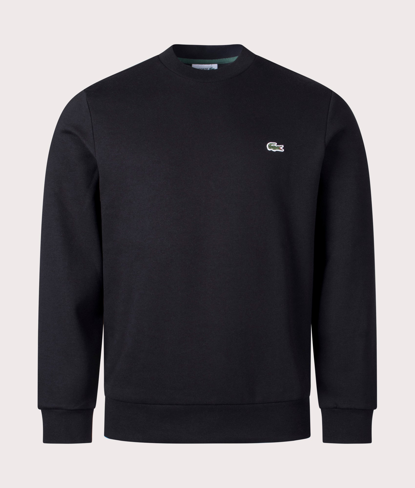 Lacoste Relaxed Fit Brushed Cotton Sweatshirt in Black at EQVVS Menswear. Front shot.
