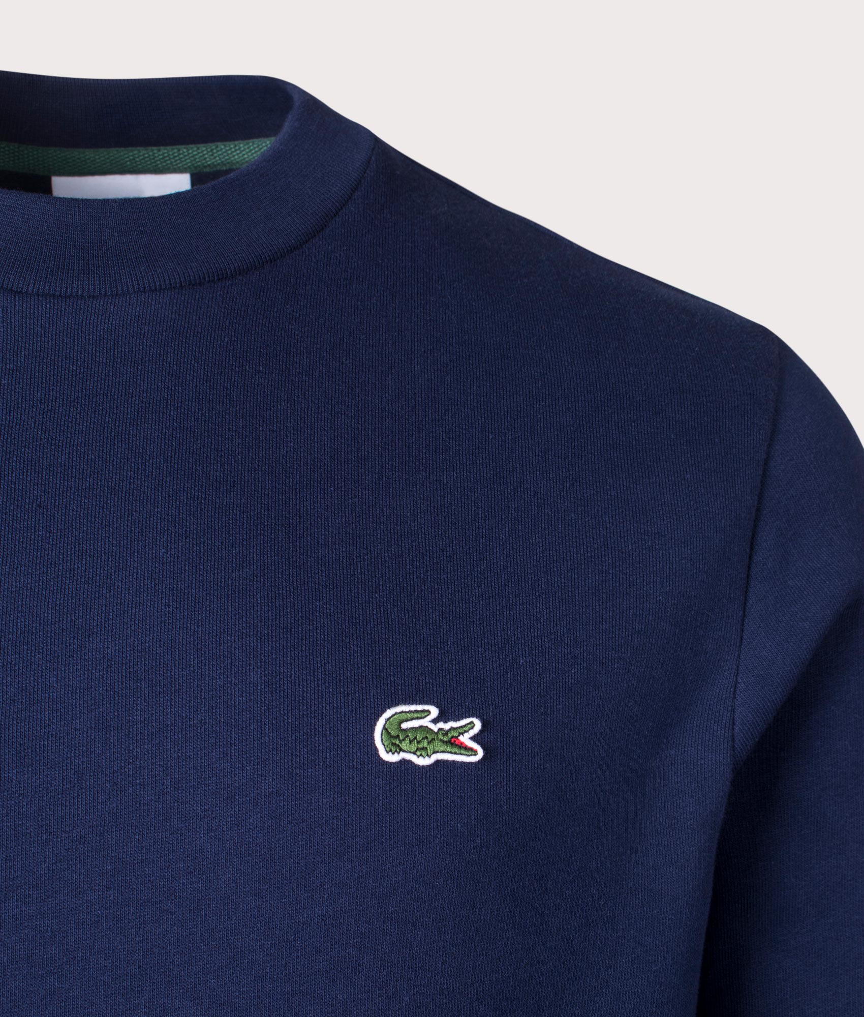 Relaxed Fit Brushed Cotton Sweatshirt in Navy Blue | Lacoste | EQVVS | Front detail shot 
