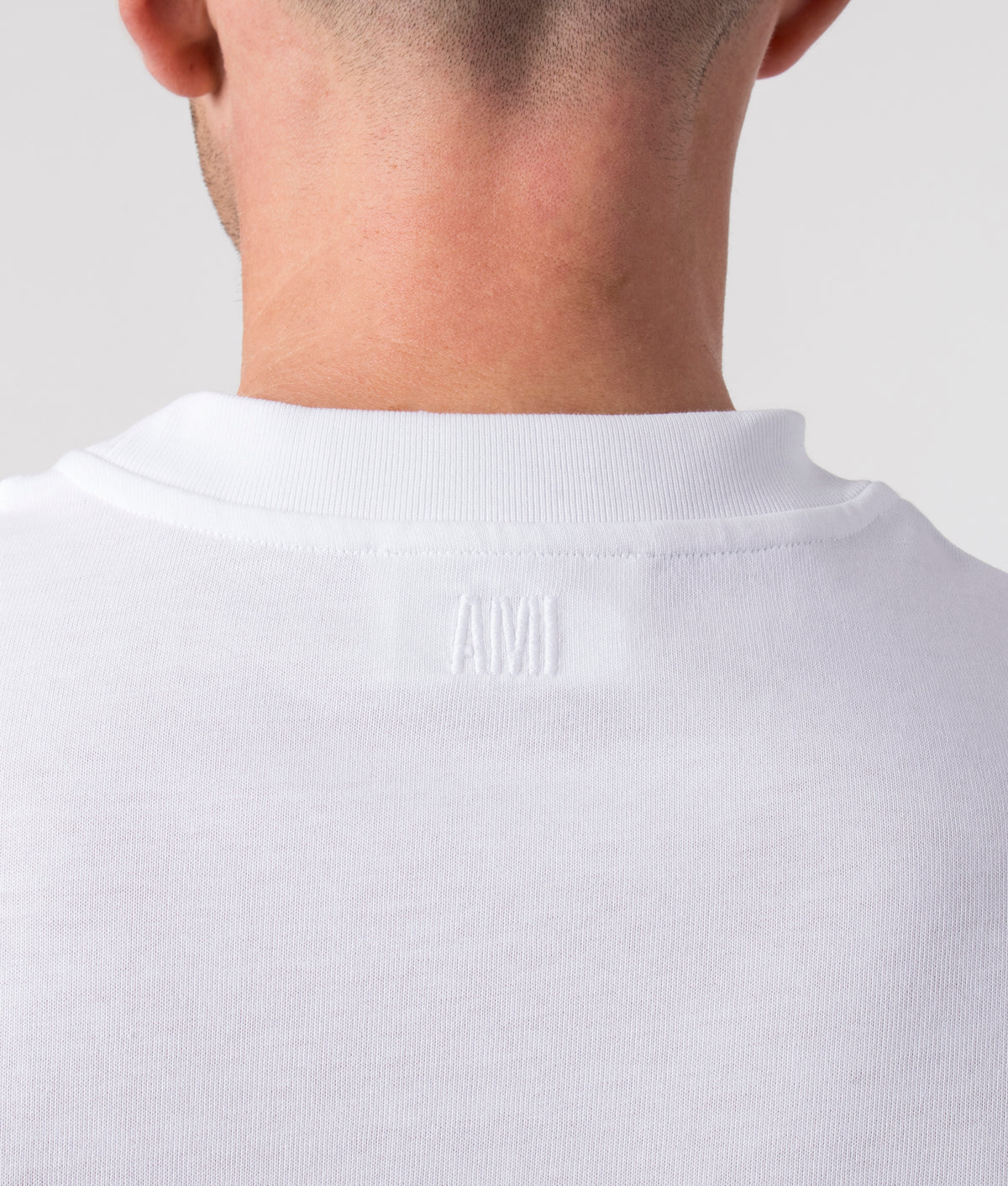 AMI-ADC-T-Shirt-White-EQVVS-detail-reverse