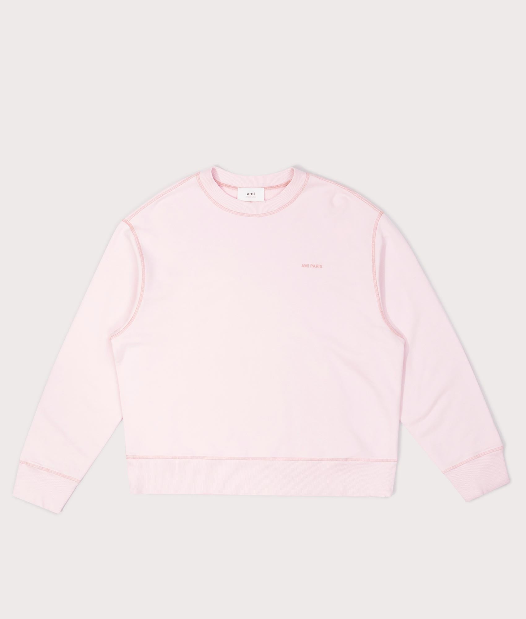 Ami Fade out Sweat shirt in Powder Pink at EQVVS Menswear. Front shot.