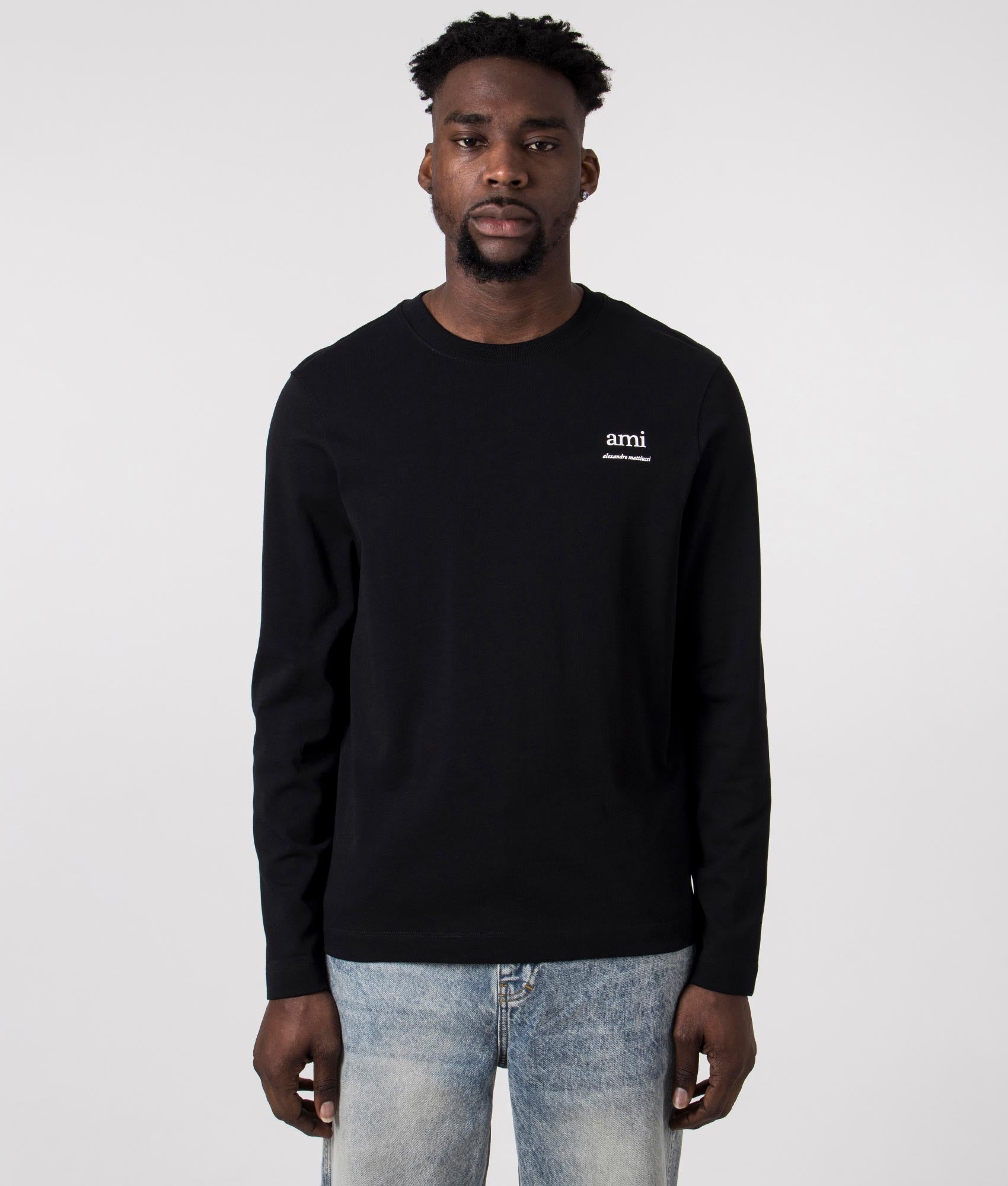 Ami T-Shirt in Black by Ami. EQVVS Front Angle Shot.
