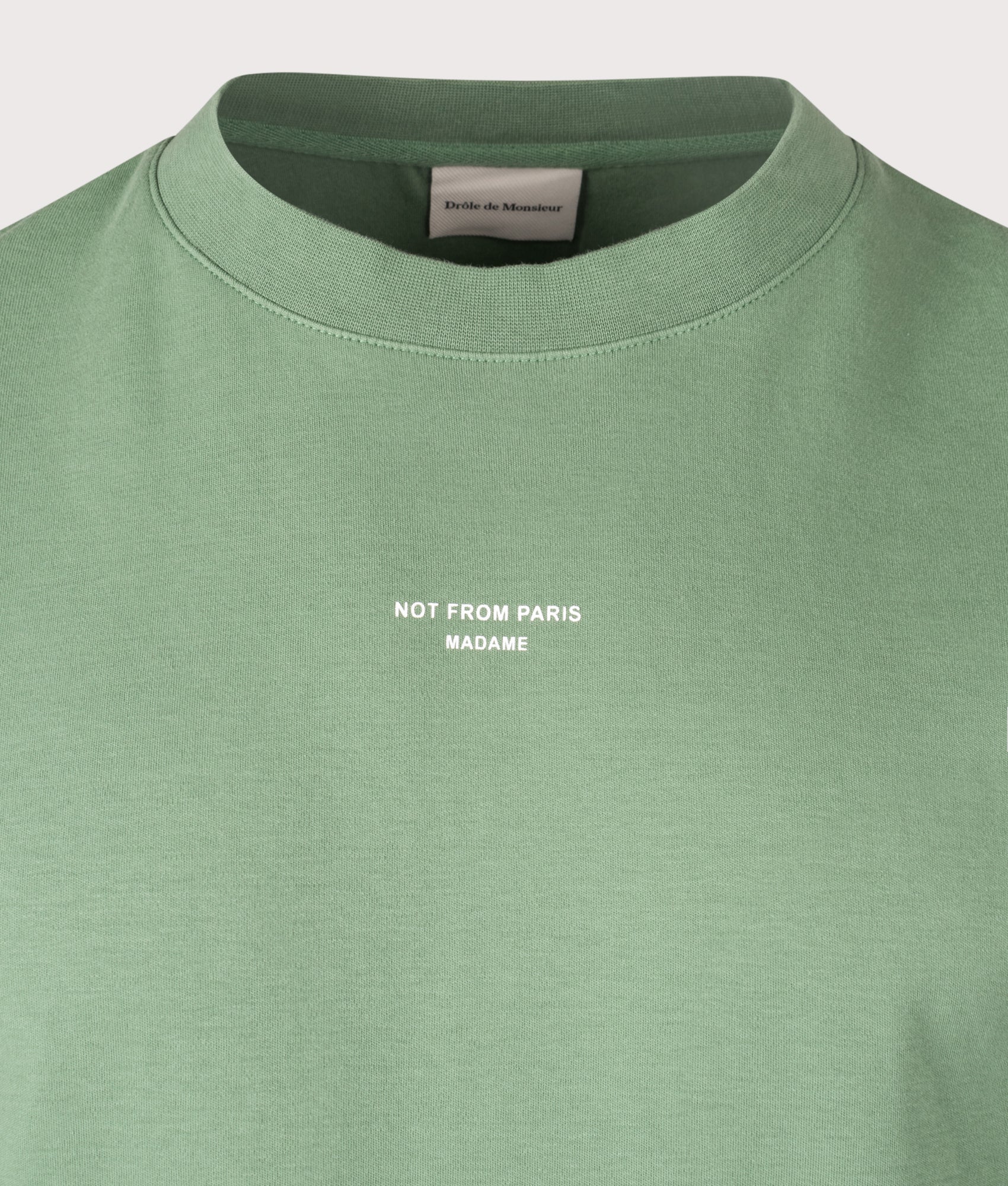 Relaxed Fit Le T-Shirt Slogan Classique in Water Green | 100% Cotton | Drôle de Monsieur | EQVVS | Front detail shot 