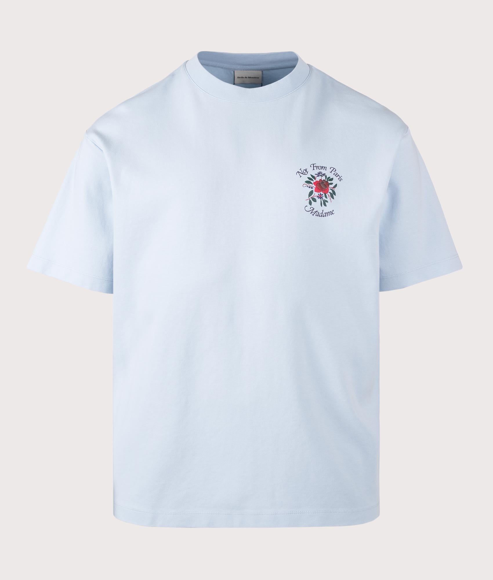 Drôle de Monsieur Slogan Rose T-Shirt in Light Blue at EQVVS Menswear. Front shot.