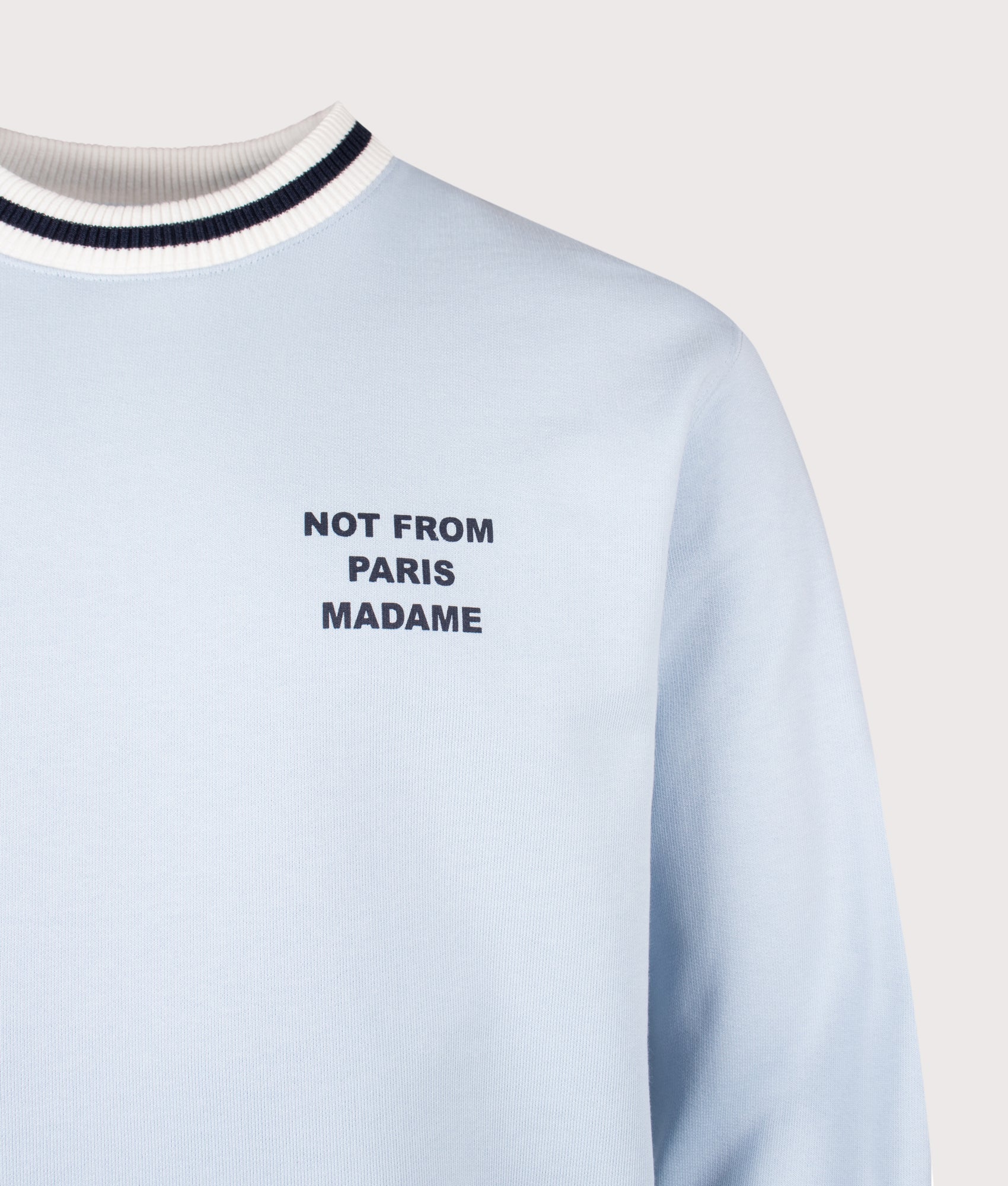 Slogan Sport Sweatshirt in Light Blue by Drôle de Monsieur. Shot by EQVVS. Detail shot.