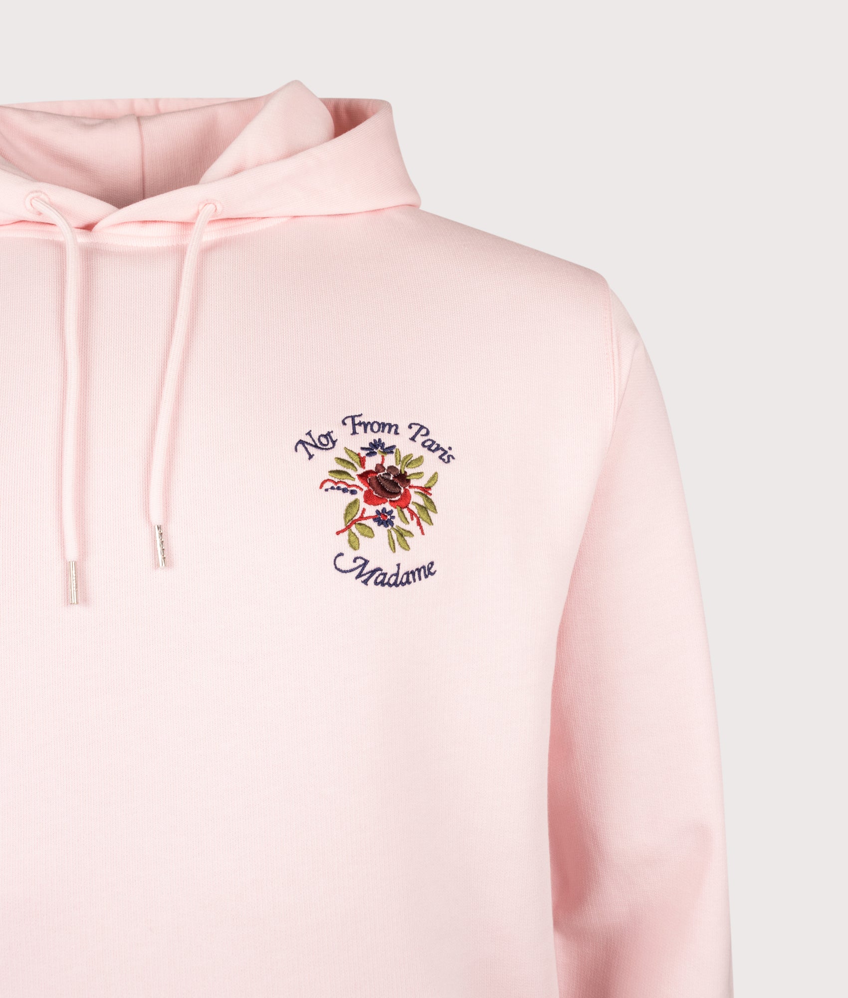 Slogan Rose Hoodie in Light Pink by Drôle de Monsieur. Shot by EQVVS. Detail shot.