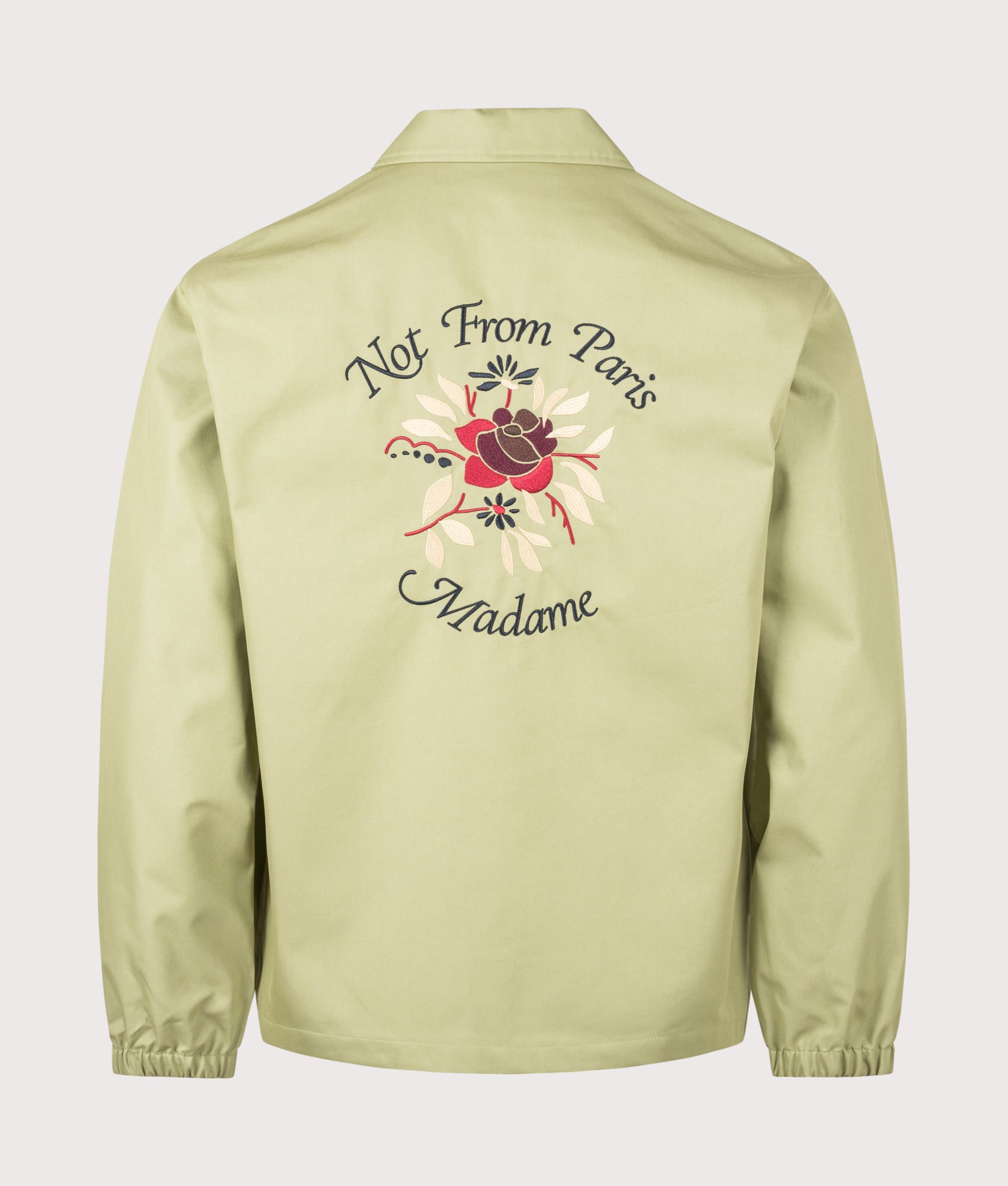 Slogan Rose Lightweight Jacket in Olive by Drôle de Monsieur. Shot by EQVVS. Back shot.