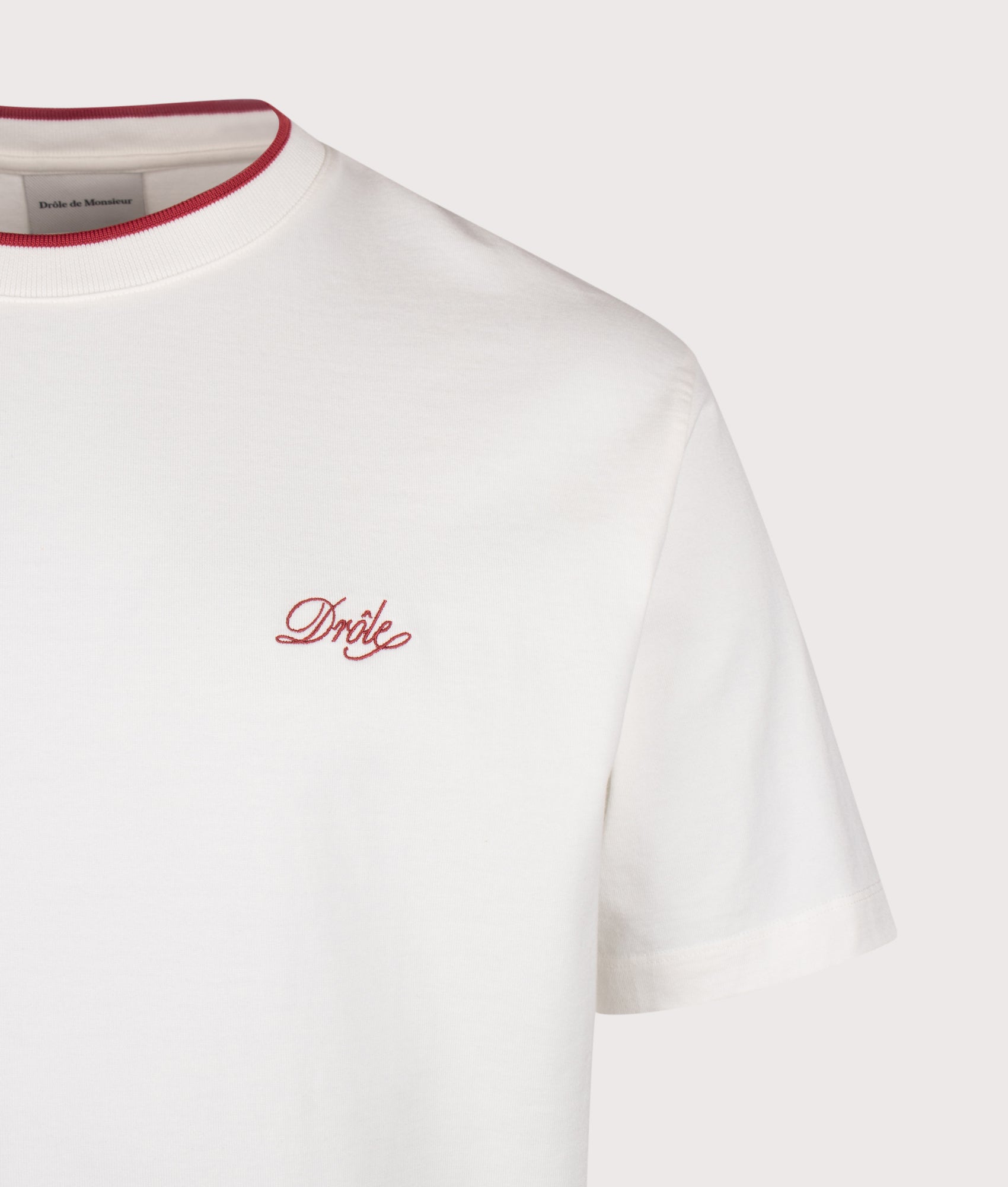 Drôle de Monsieur Drôle Belissima T-Shirt in Off White at EQVVS Menswear. Detail shot.