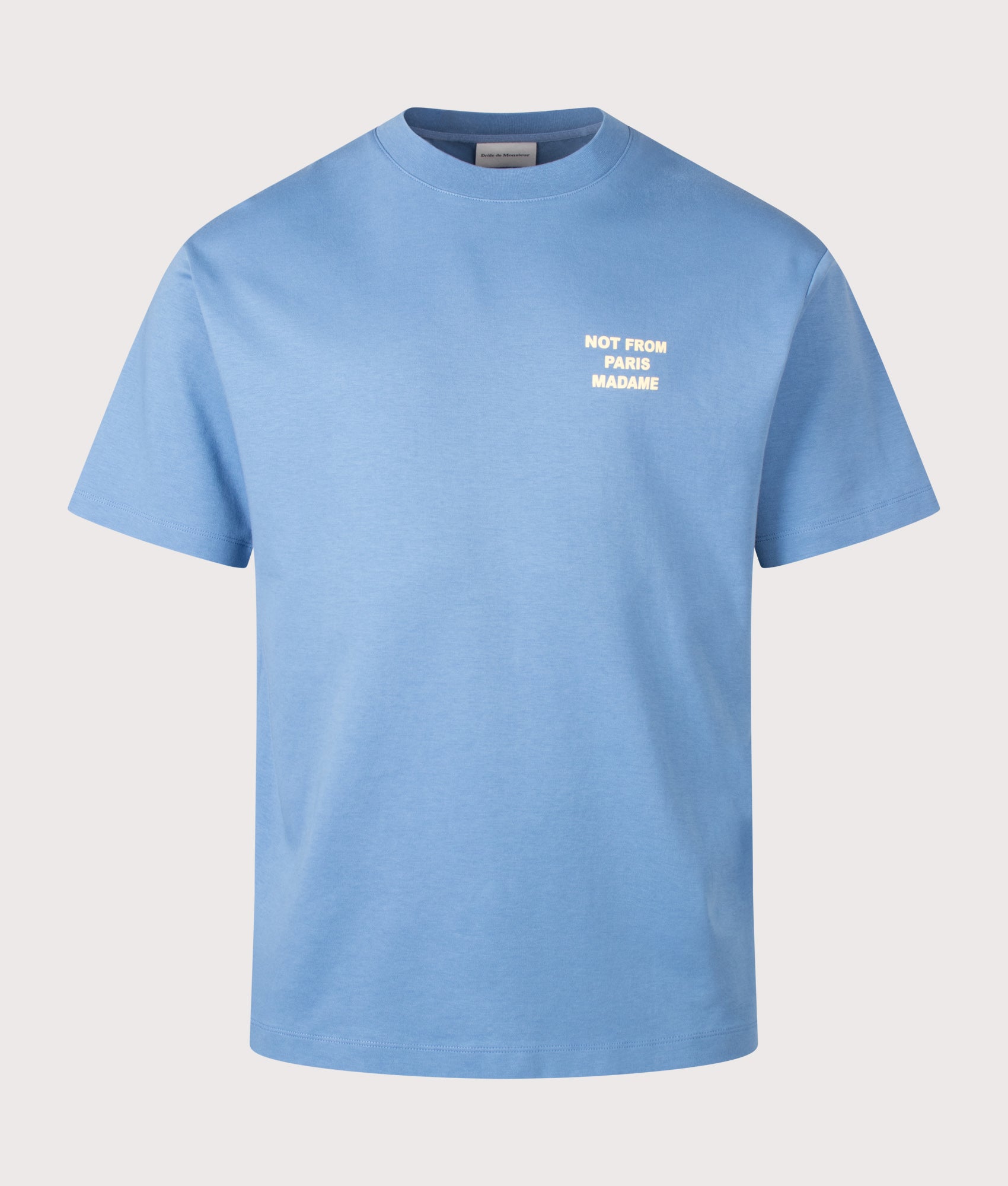 Drôle de Monsieur Relaxed Fit Slogan T-Shirt in Atlantic Blue at EQVVS Menswear. Front shot.