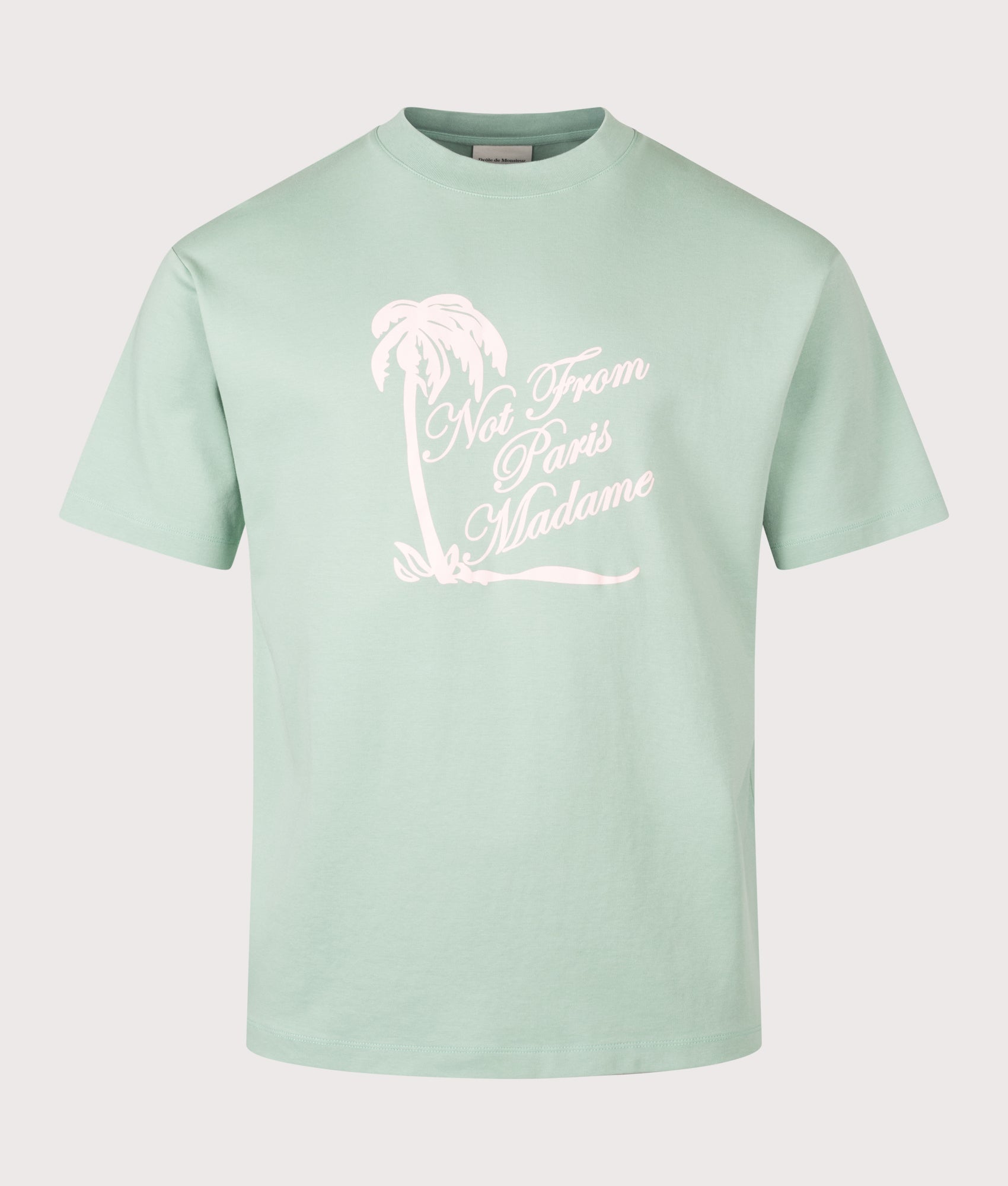 Drôle de Monsieur Palm Slogan T-Shirt in Water Green at EQVVS Menswear. Front shot.