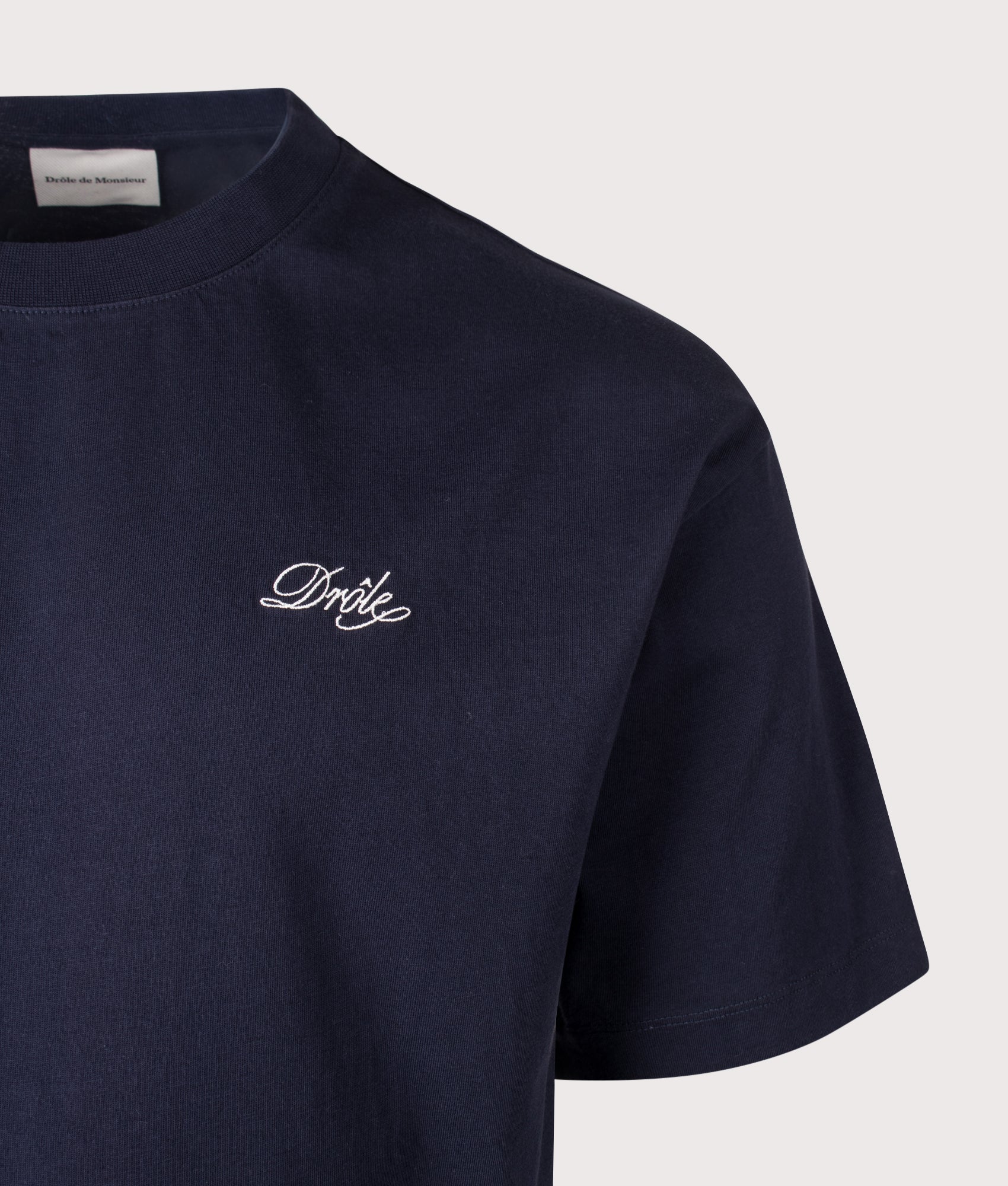 Drôle de Monsieur Relaxed Fit Drôle Belissima T-shirt in Navy at EQVVS Menswear. Detail shot.
