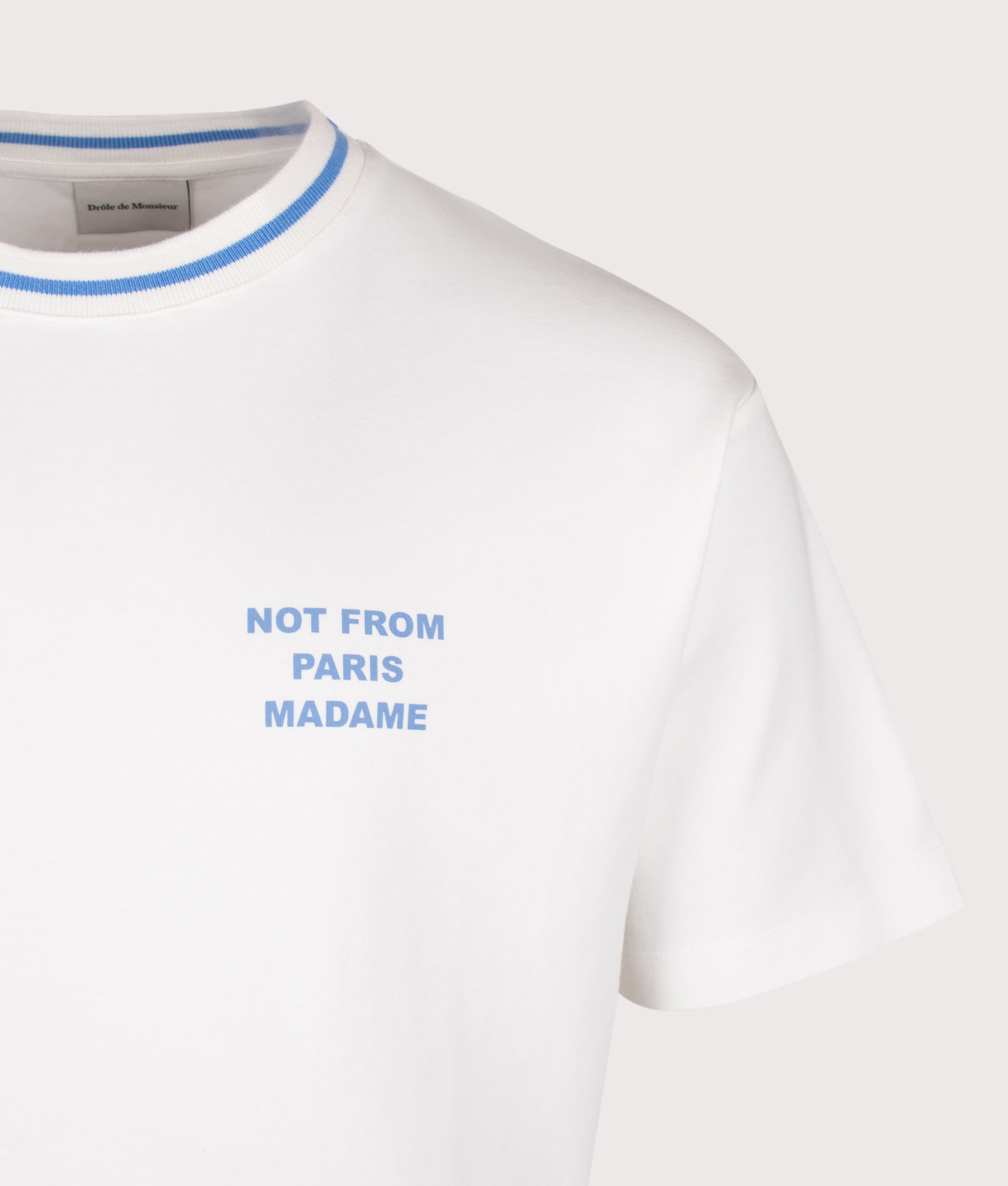 Drôle de Monsieur Sport Slogan T-shirt in Off White at EQVVS Menswear. Back shot.