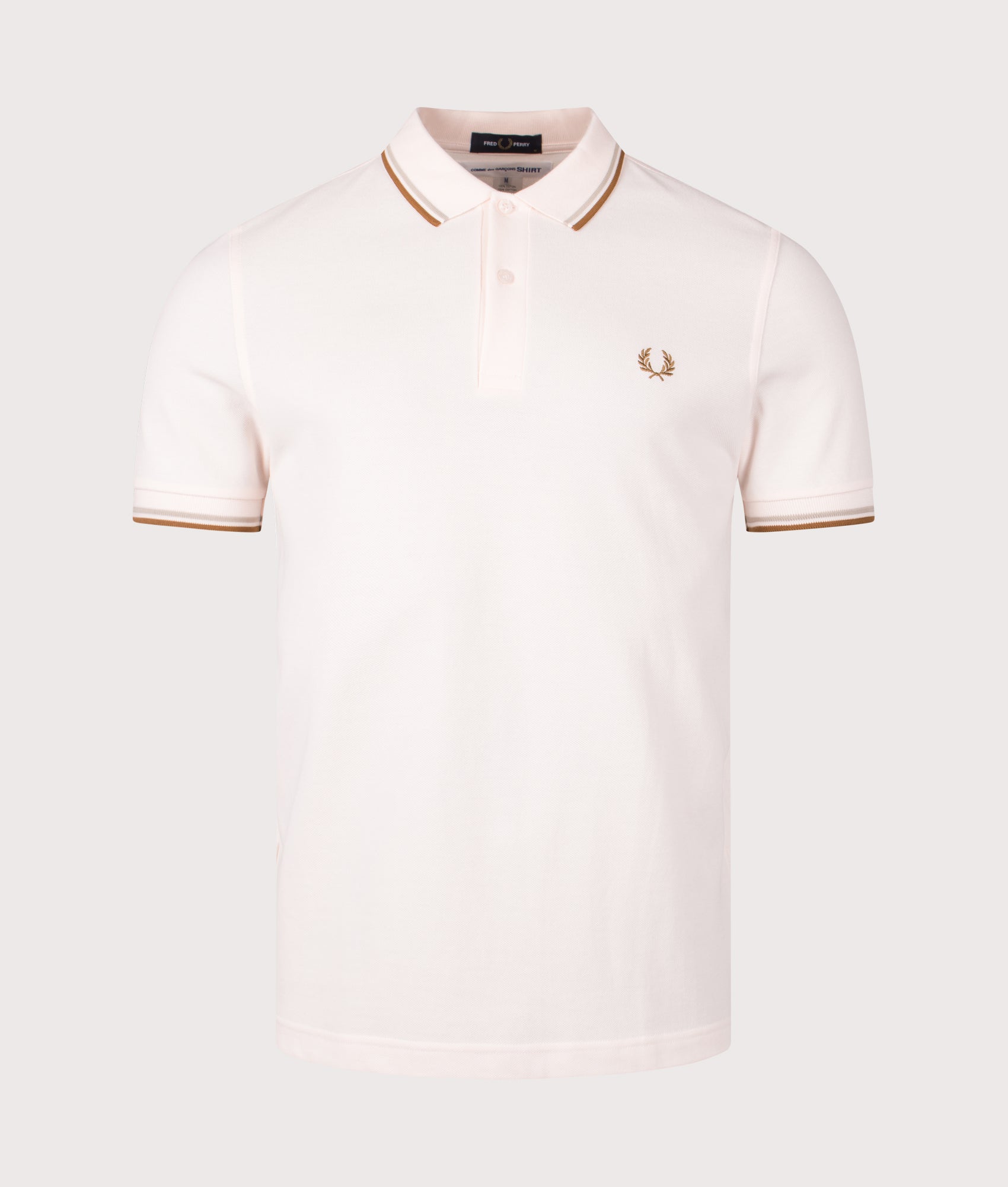 COMME des GARÇONS x Fred Perry Freedom is Energy Polo Shirt. Shot by EQVVS. Front shot.