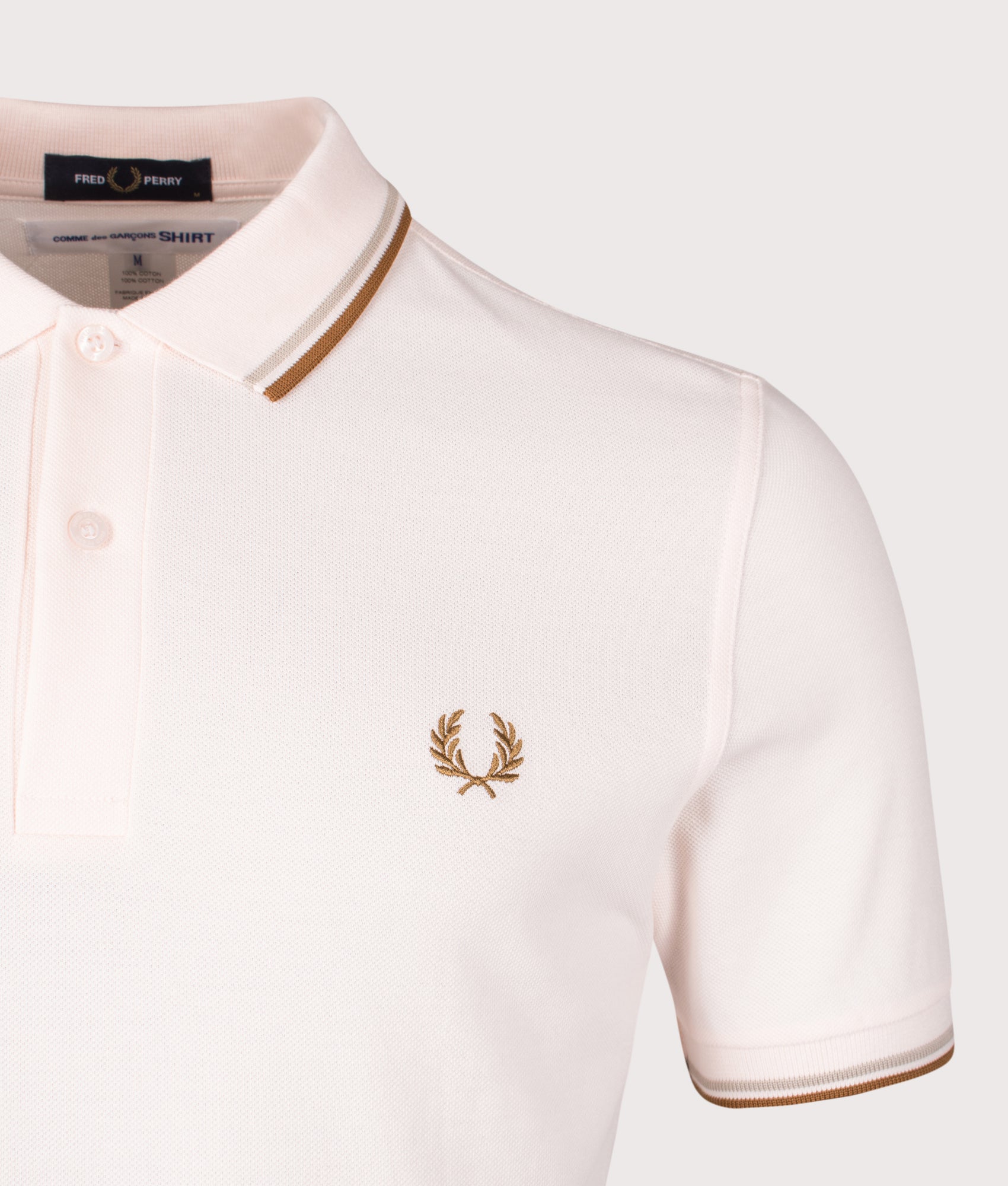 COMME des GARÇONS x Fred Perry Freedom is Energy Polo Shirt. Shot by EQVVS. Detail shot.