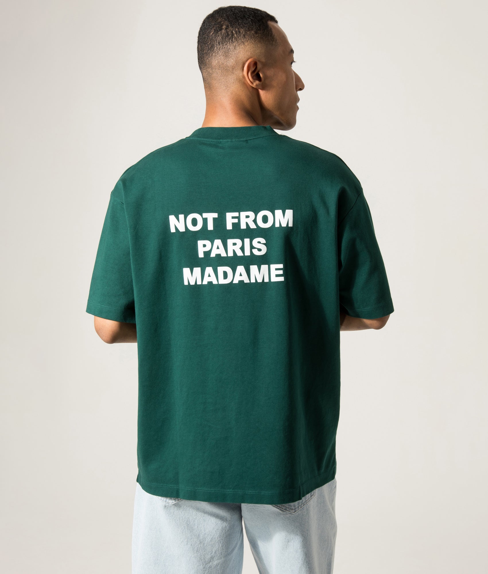 Le T-Shirt Slogan. Shot by EQVVS. Back print model shot.