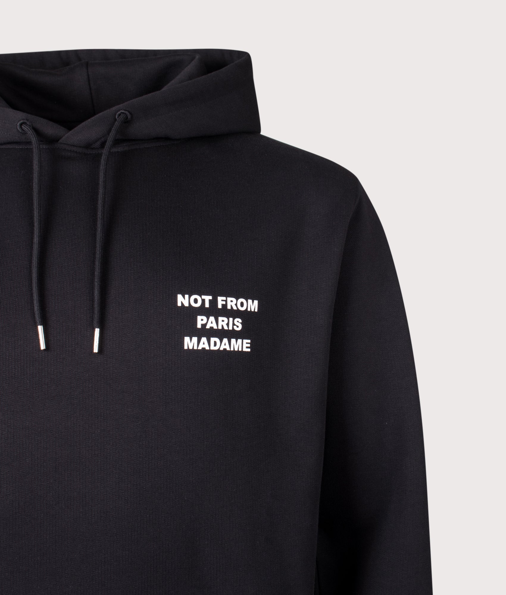Slogan Hoodie in Black by Drôle de Monsieur. Shot by EQVVS. Detail shot.