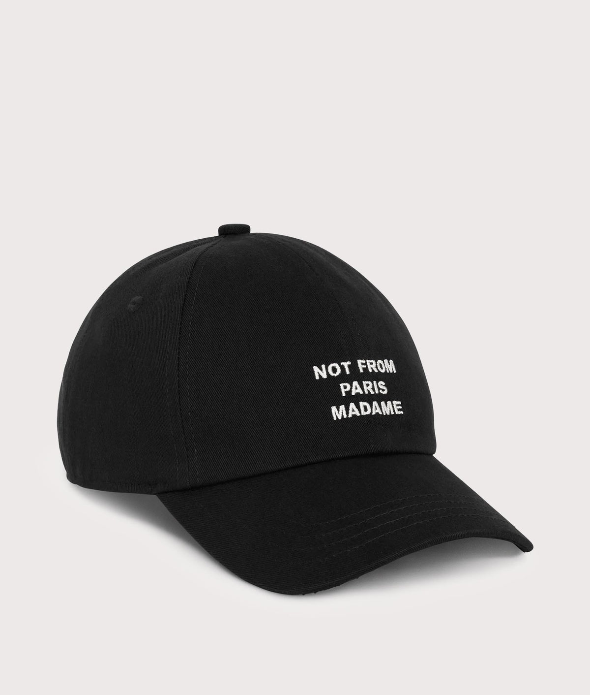 Drôle de Monsieur Slogan Cap in Black at EQVVS Menswear. Angled front shot.