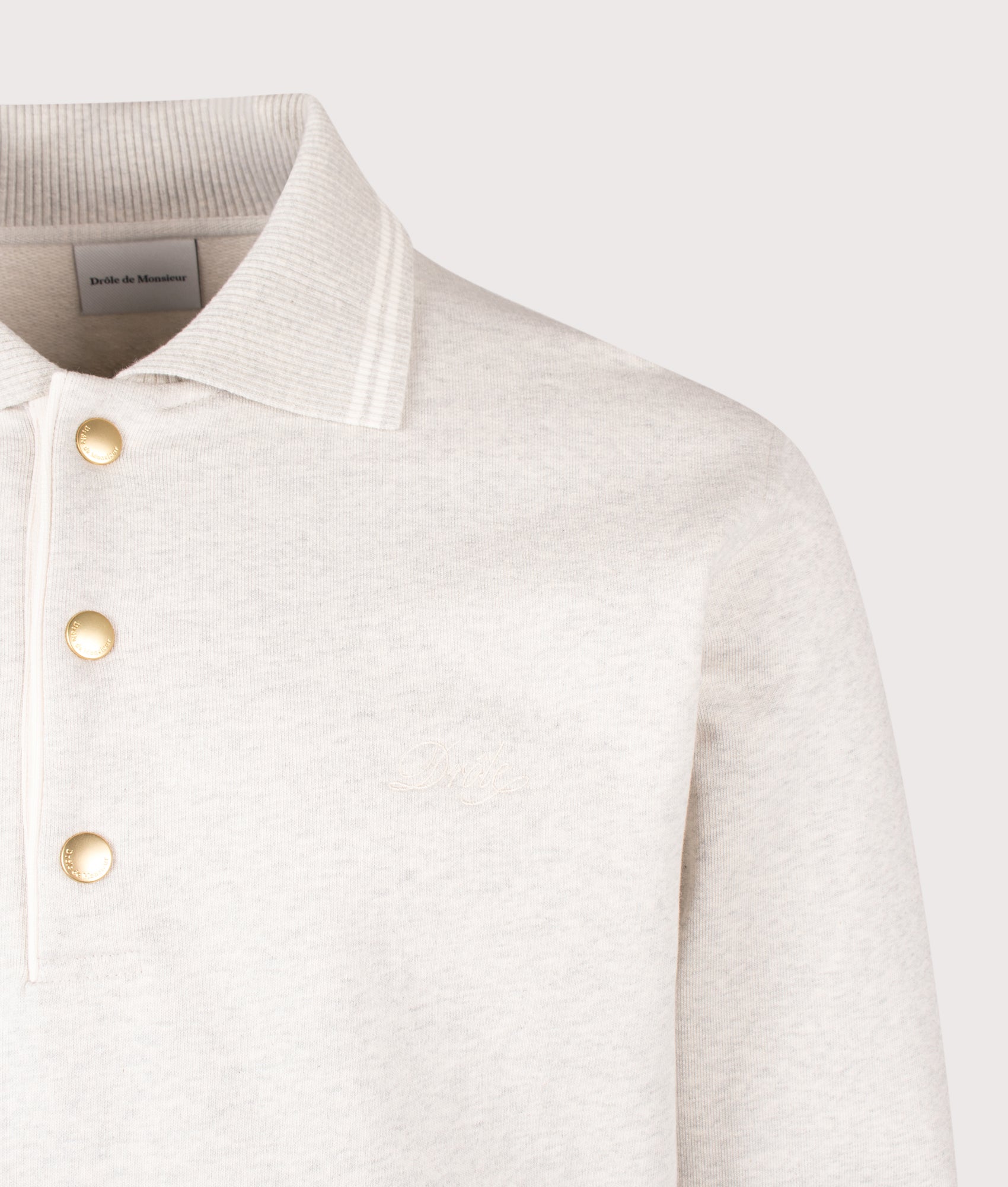 Drôle de Monsieur Drôle Long Sleeve Polo Shirt in Grey at EQVVS Menswear. Detail shot.