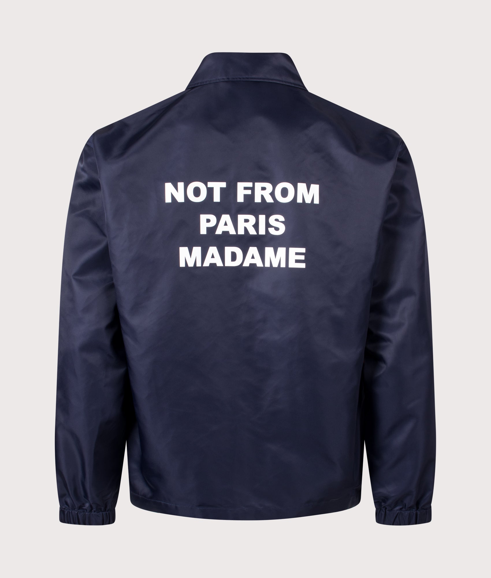 Slogan Jacket in Navy 
by Drôle de Monsieur. Shot by EQVVS. Back shot.