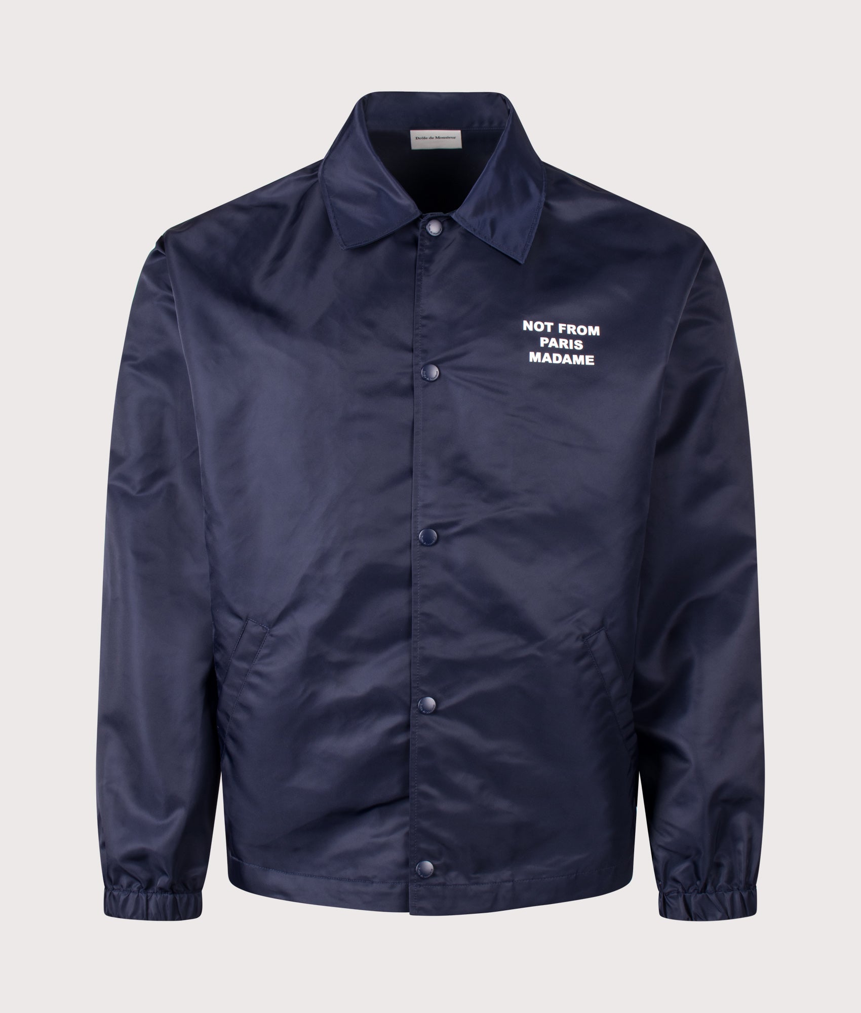 Slogan Jacket in Navy 
by Drôle de Monsieur. Shot by EQVVS. Front shot.