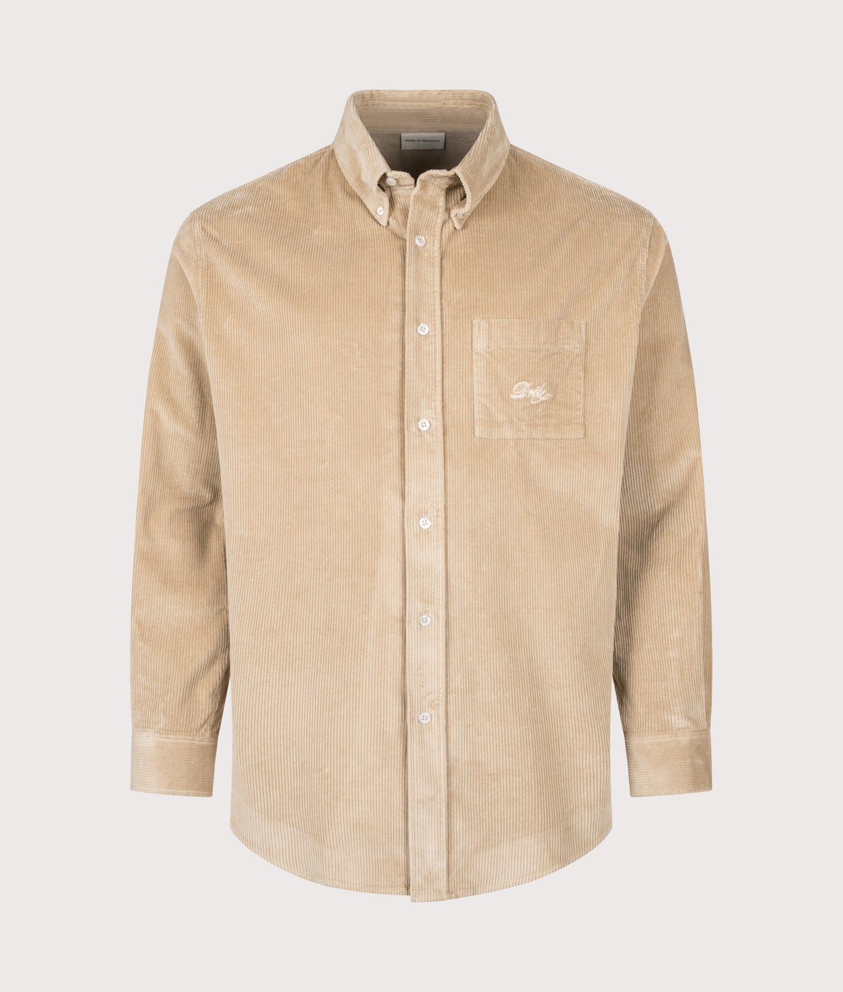 Drôle de Monsieur Relaxed Fit Corduroy Shirt in Beige at EQVVS Menswear. Front shot.