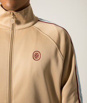 La Veste Survítement Track Top. Shot by EQVVS. Detail model shot.
