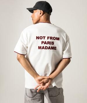 Le T-Shirt Slogan Piquè. Shot by EQVVS. Back print model shot.