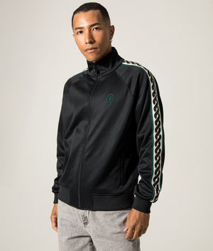 La Veste Survêtement Track Top. Shot by EQVVS. Front angled model shot.