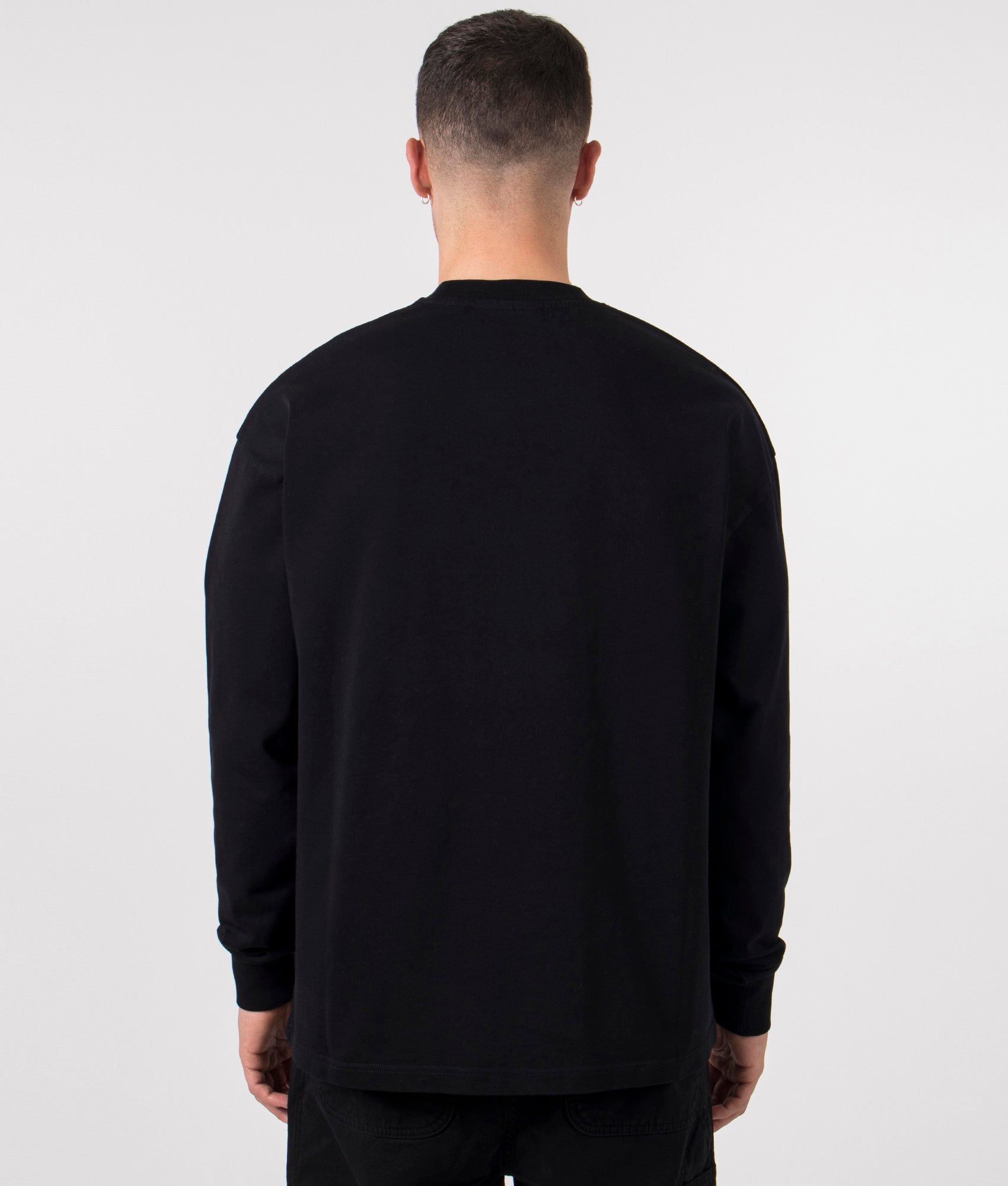 Oversized Uniform Long Sleeve T-Shirt in Black byMKI MIYUKI ZOKU. EQVVS Model Shot.
