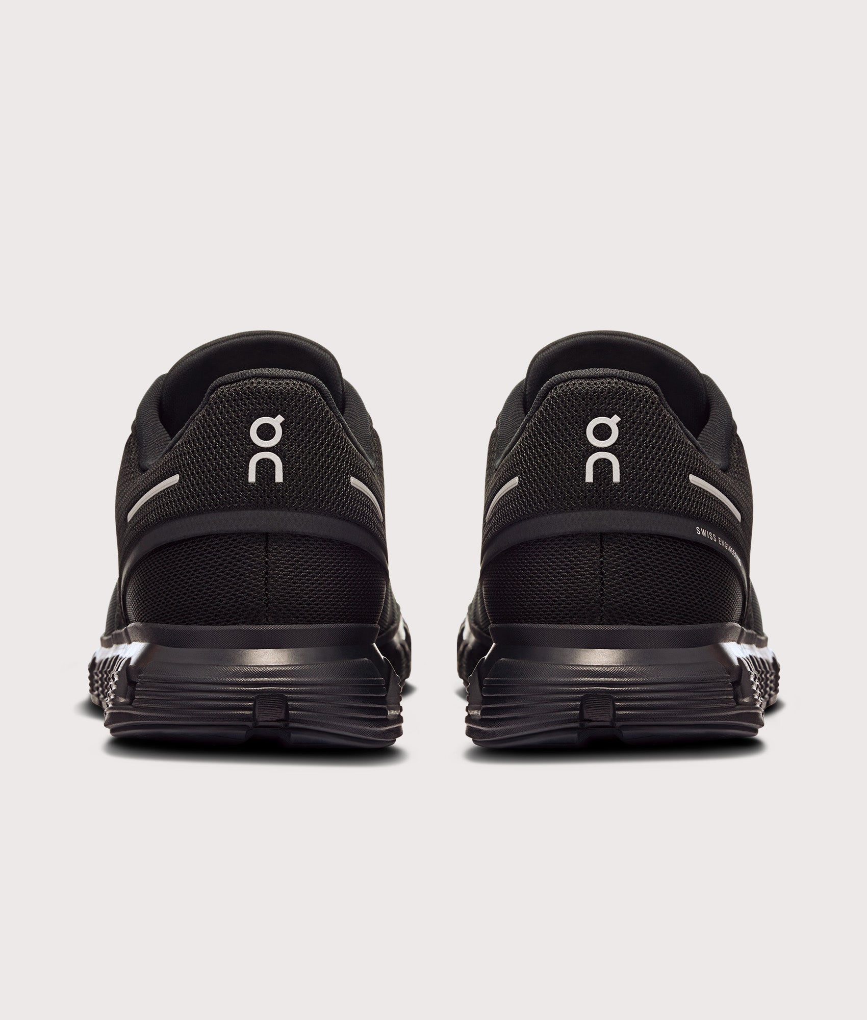 On Cloud 6 Sneakers in Black/Black at EQVVS Menswear. Back shot.