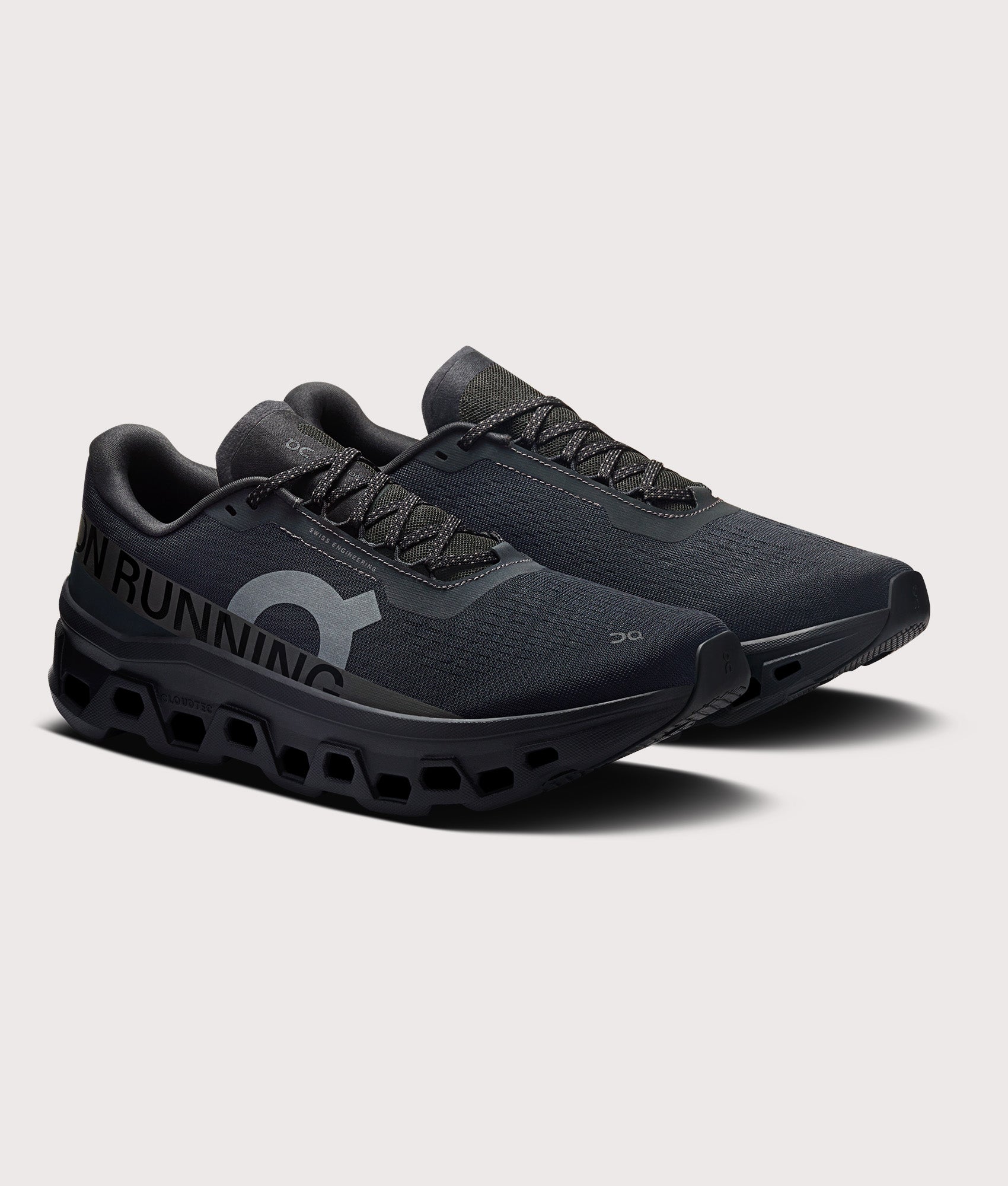 On Cloudmonster 1 Sneakers in Black/Black at EQVVS Menswear. Angled front shot.