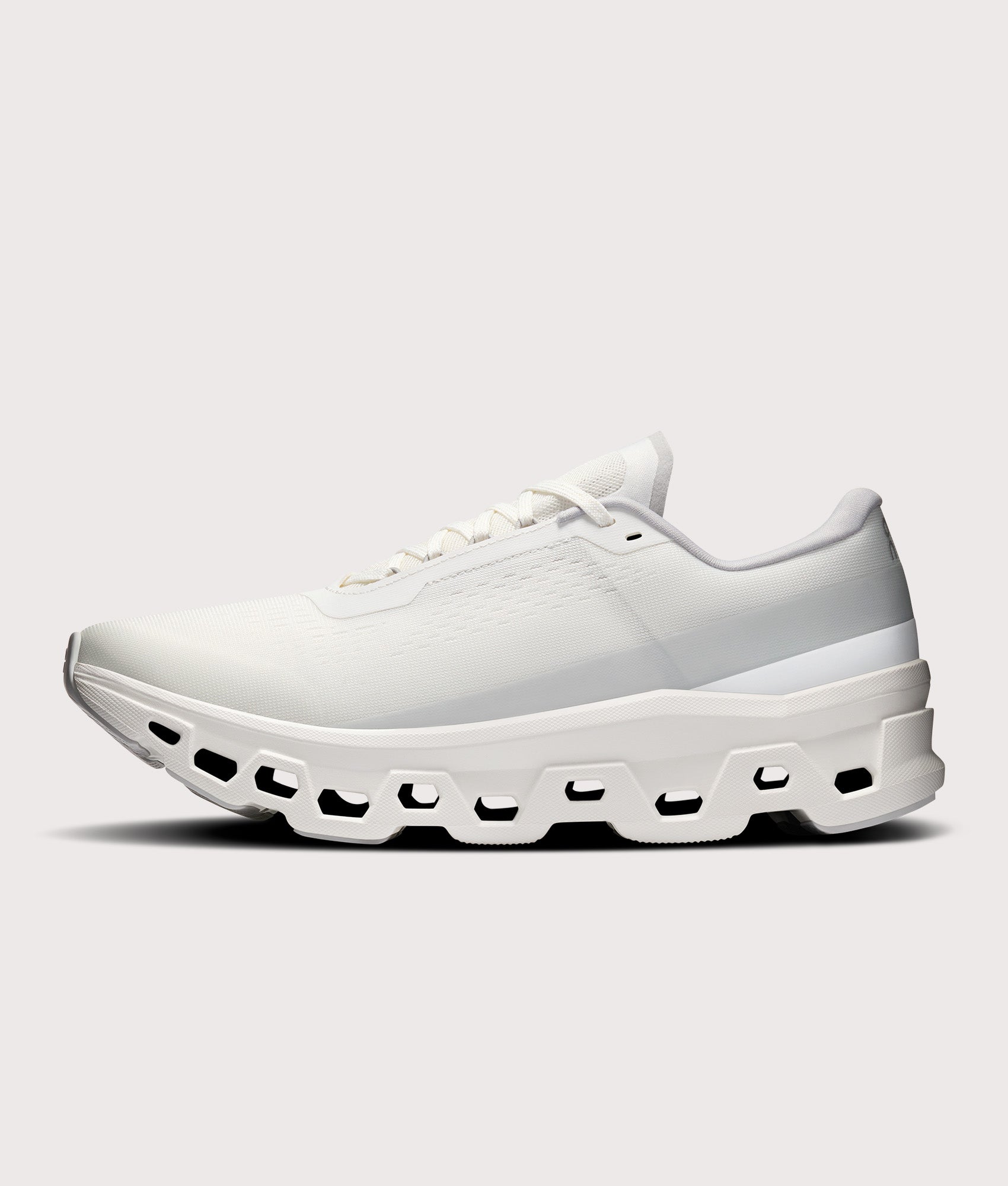 On Cloudmonster 1 Sneakers in White/White at EQVVS Menswear. Side shot.