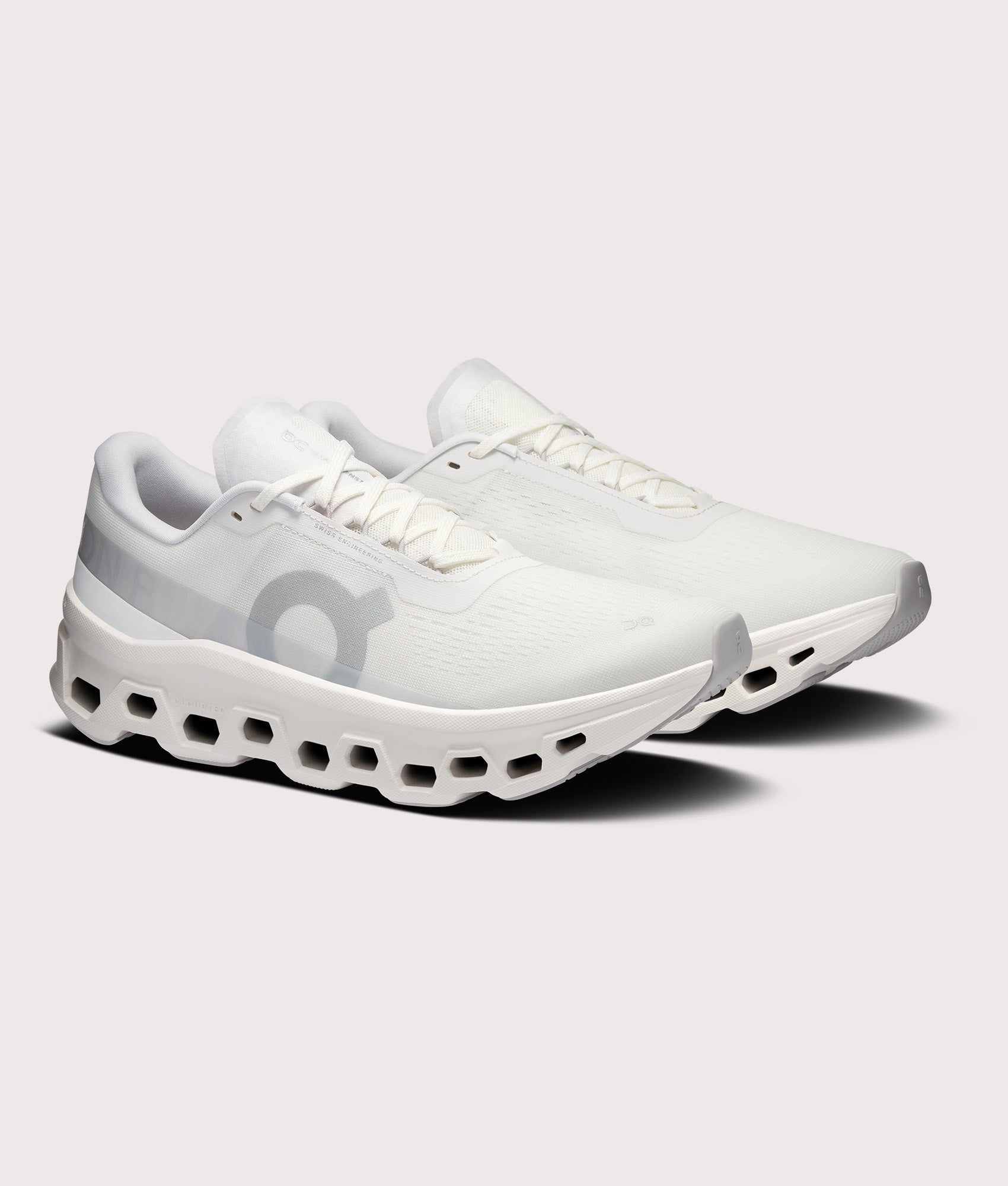 On Cloudmonster 1 Sneakers in White/White at EQVVS Menswear. Angled front shot.