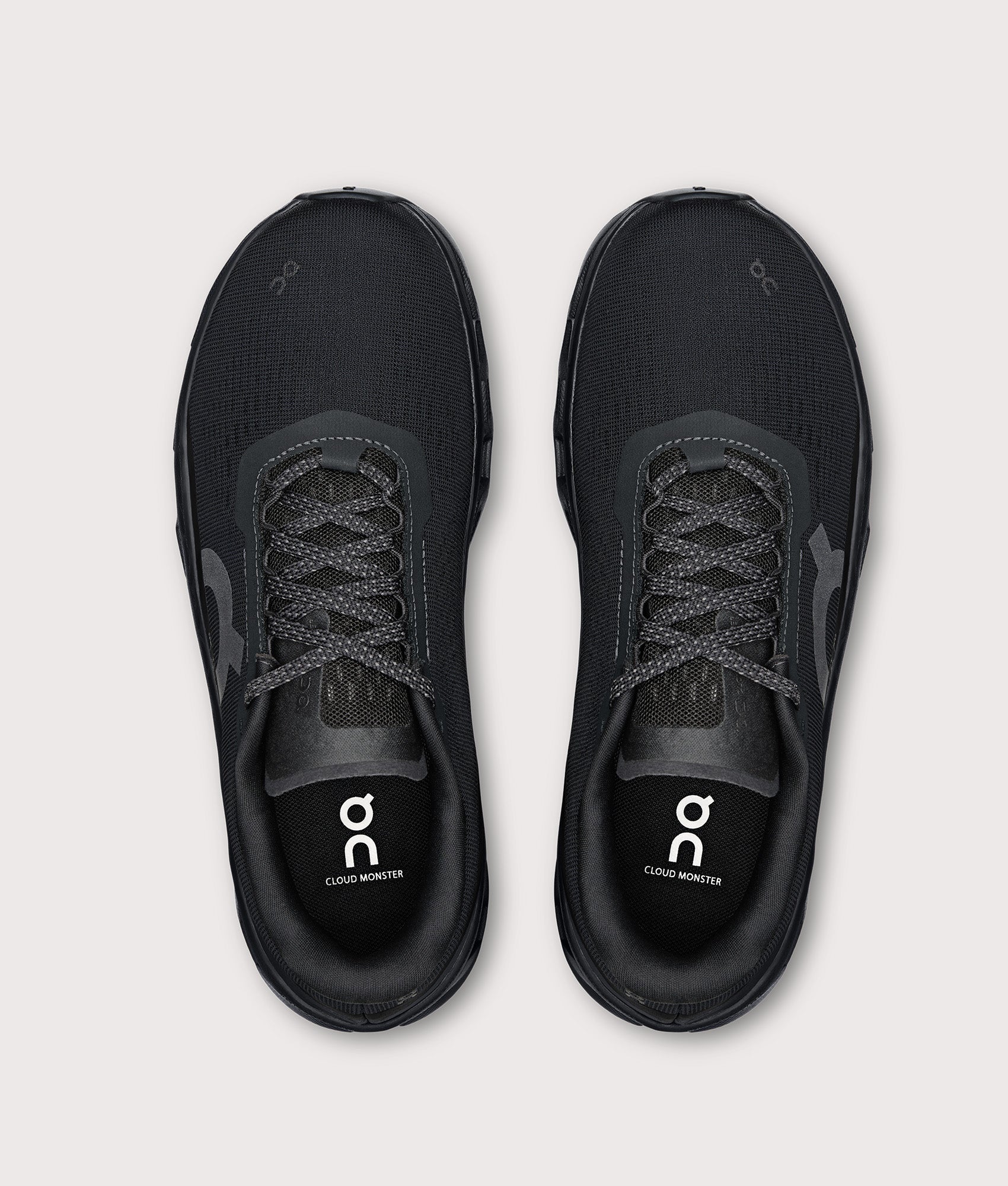 On Cloudmonster 1 Sneakers in Black/Black at EQVVS Menswear. Top shot.