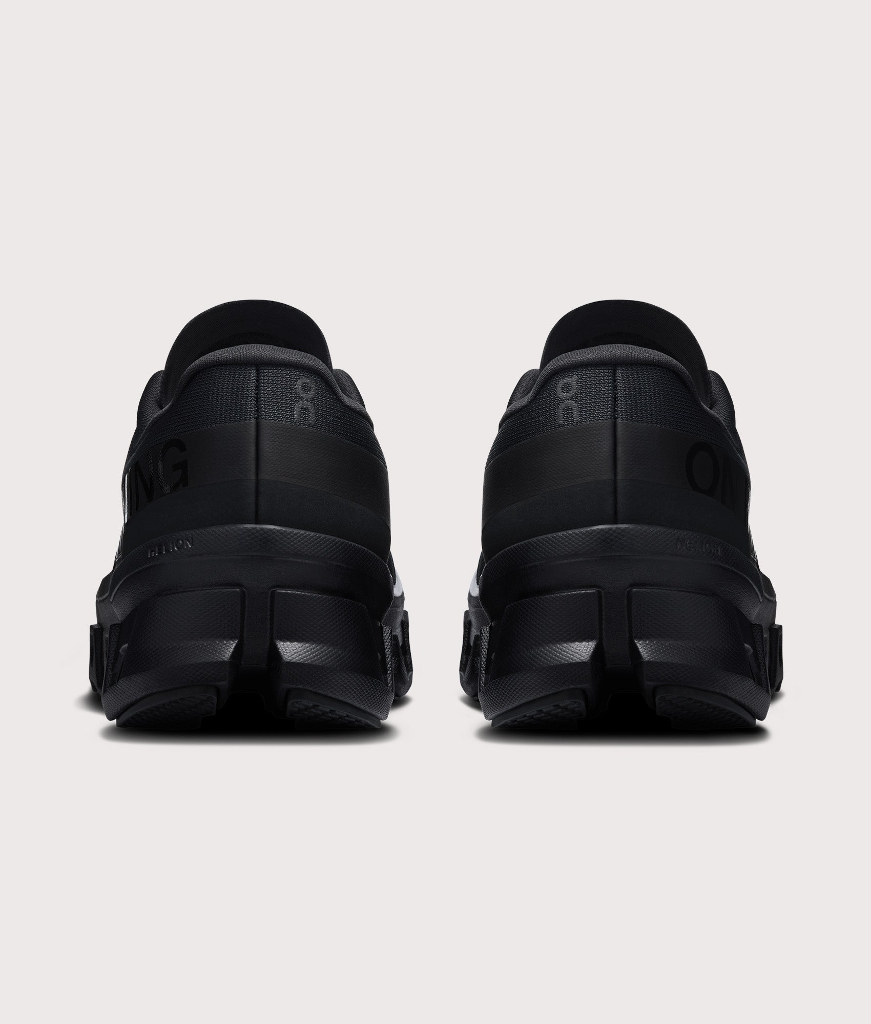 On Cloudmonster 1 Sneakers in Black/Black at EQVVS Menswear. Back shot.