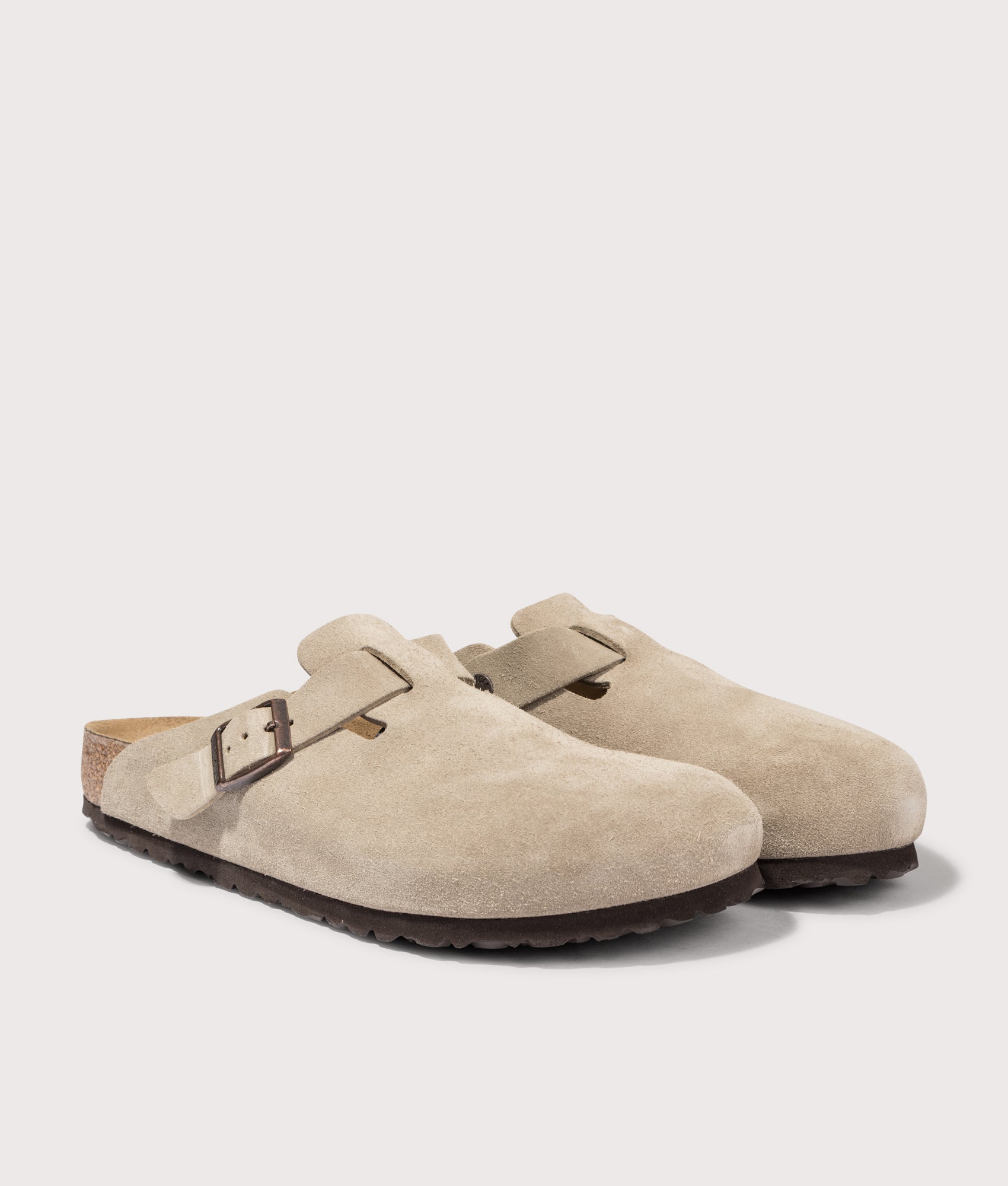 Birkenstock Boston Suede Leather Clogs in Taupe at EQVVS. Front shot. 