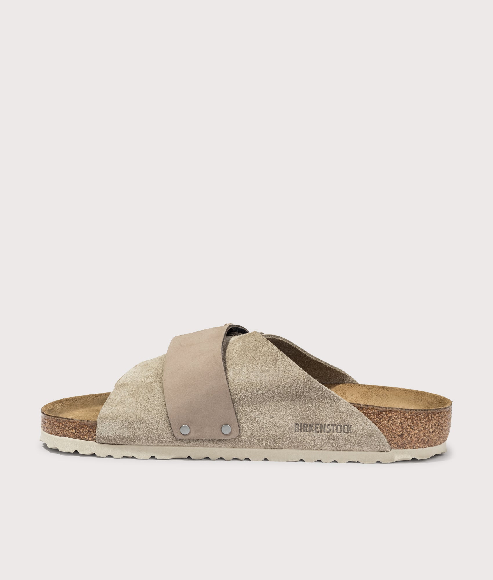 BIRKENSTOCK Kyoto Nubuck-Suede Leather Sandals in Taupe at EQVVS Menswear. Side two shot.