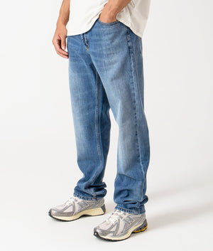 Carhartt WIP Marlow Jeans - Blue Rinsed Jeans - EQVVS. Angle shot. 
