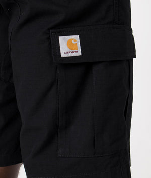 Aviation Cargo Shorts in Black by Carhartt WIP. Detail shot at EQVVS.