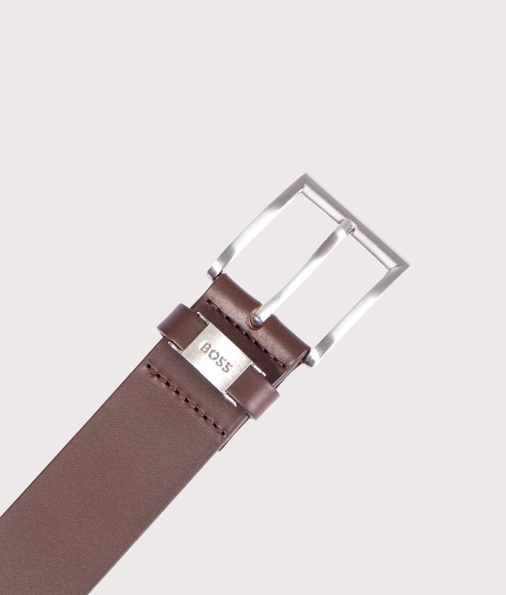 BOSS Italian Leather Connio Belt in Dark Brown at EQVVS Menswear. Front shot.