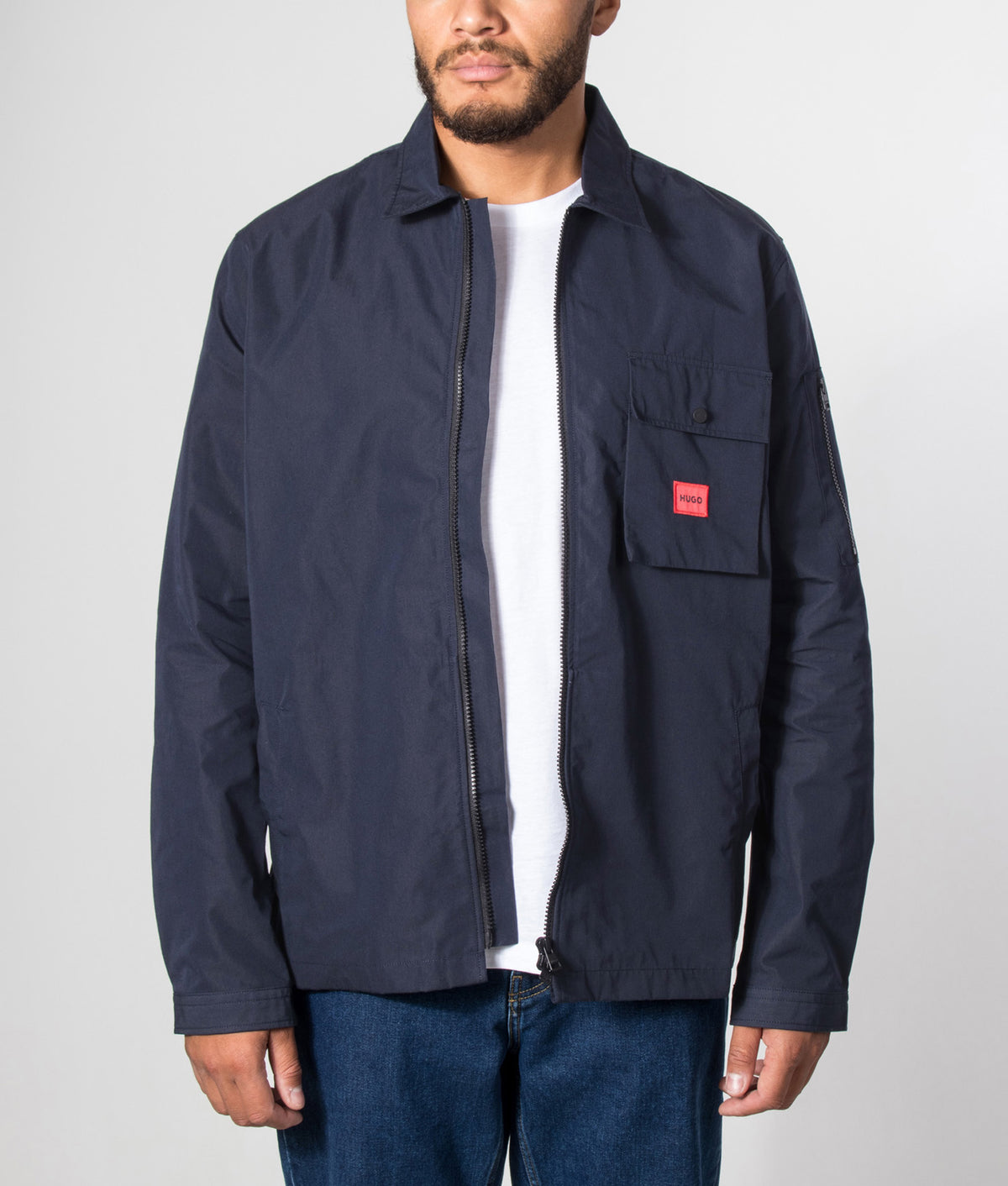 HUGO release the Relaxed Fit Emmond Zip Through Overshirt, arriving this season in the Dark Blue. Model front shot.