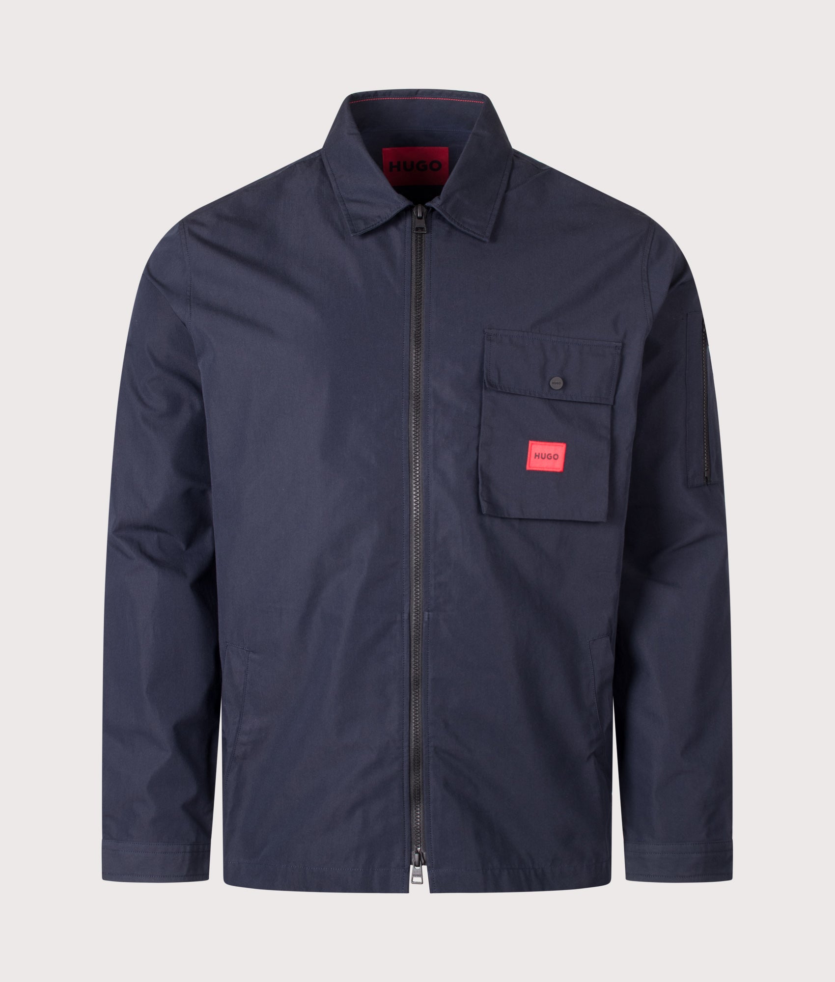 HUGO Relaxed Fit Emmond Zip Through Overshirt in Dark Blue at EQVVS Menswear. Front shot.